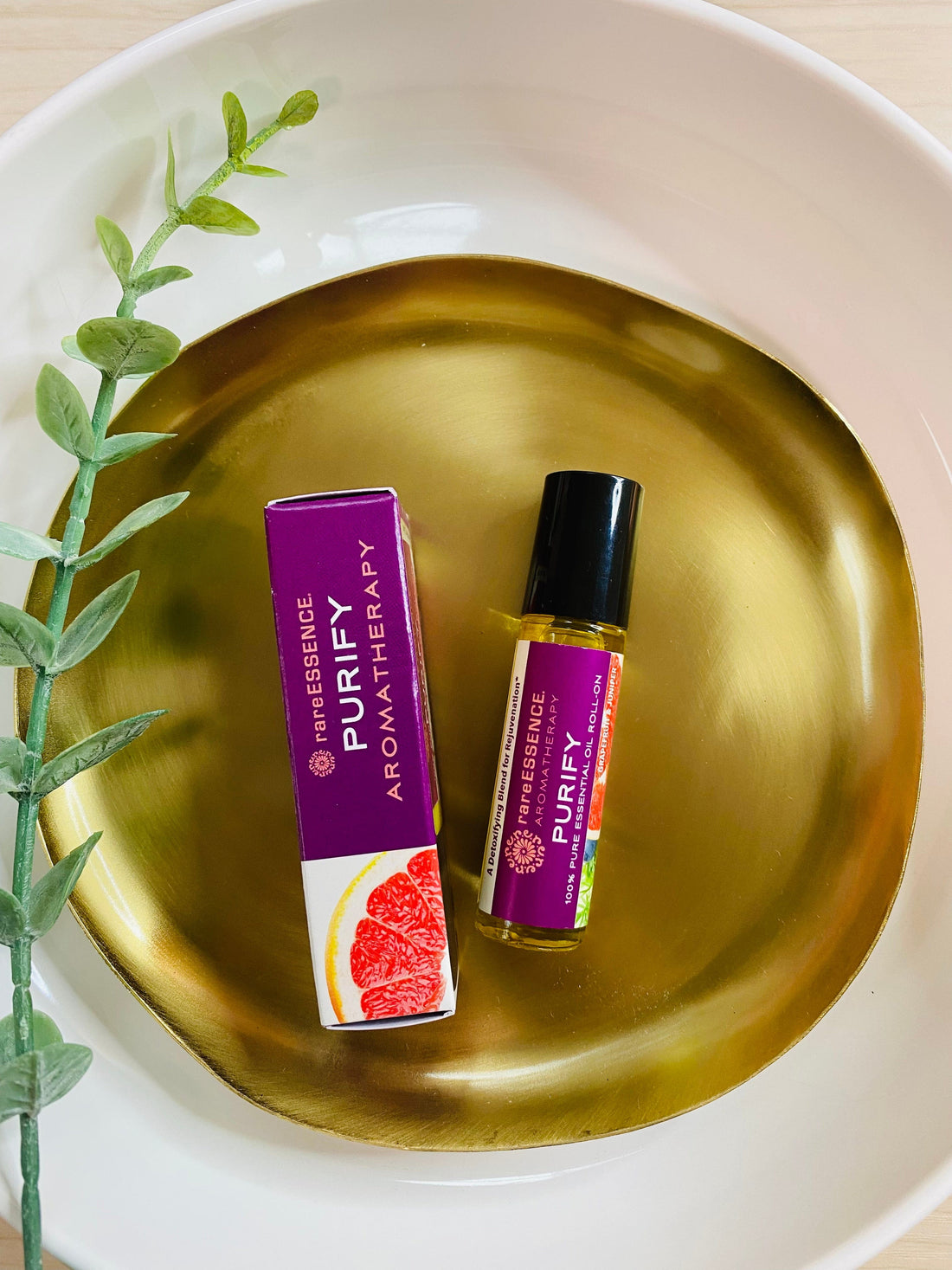 PURIFY Aromatherapy Roll-On with 100% pure essential oils like Lemon, Juniper-berry, and Palmarosa. Easy, convenient, and organic