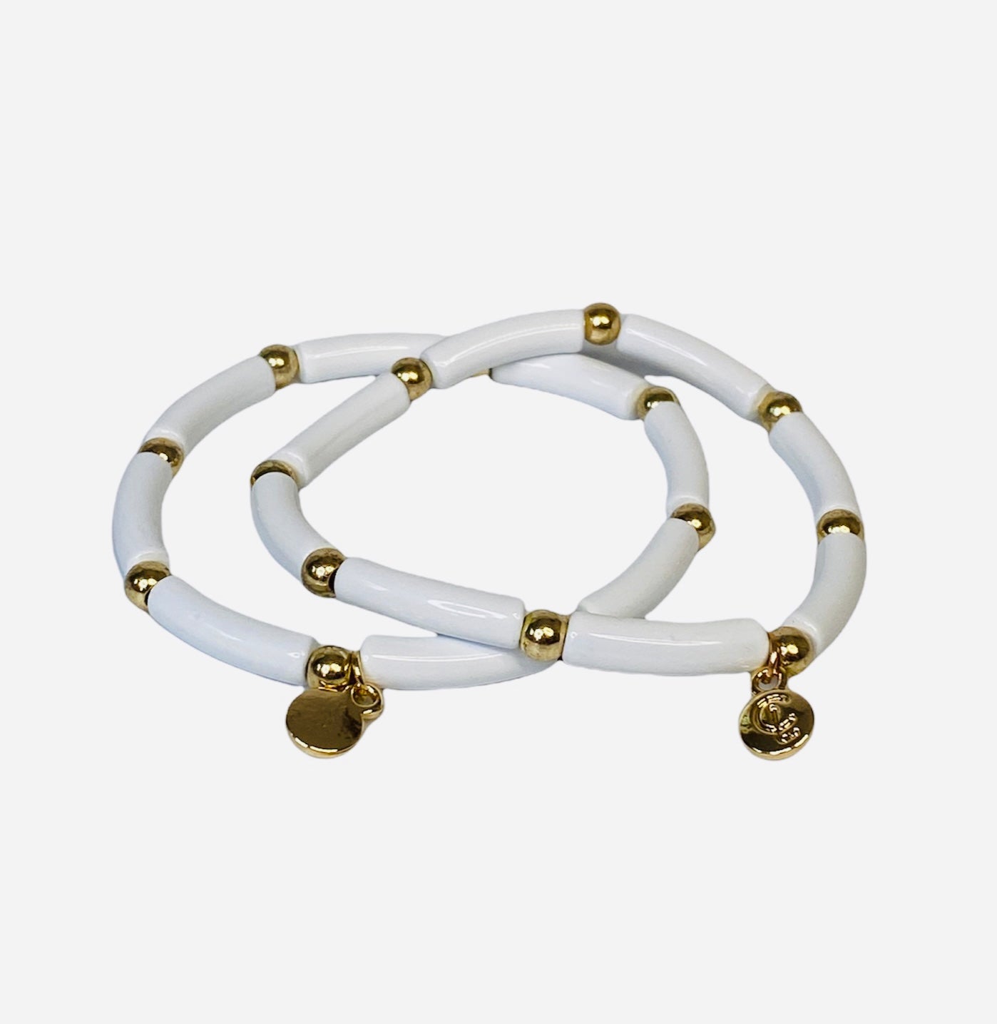 Kenzie Bracelet, featuring gold and white enamel with 14K overlay, perfect for layering or mixing and matching with your favorites