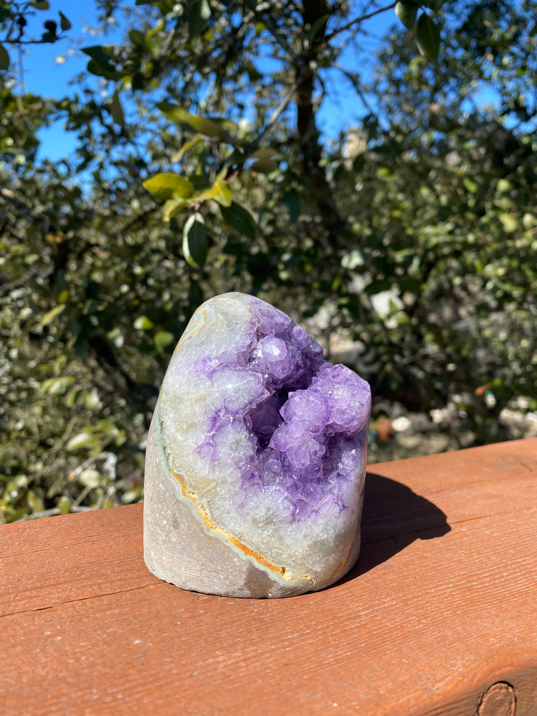 Lavender Amethyst and Quartz crystals with orange and green Brazilian Agate banding, polished edges, and natural back.