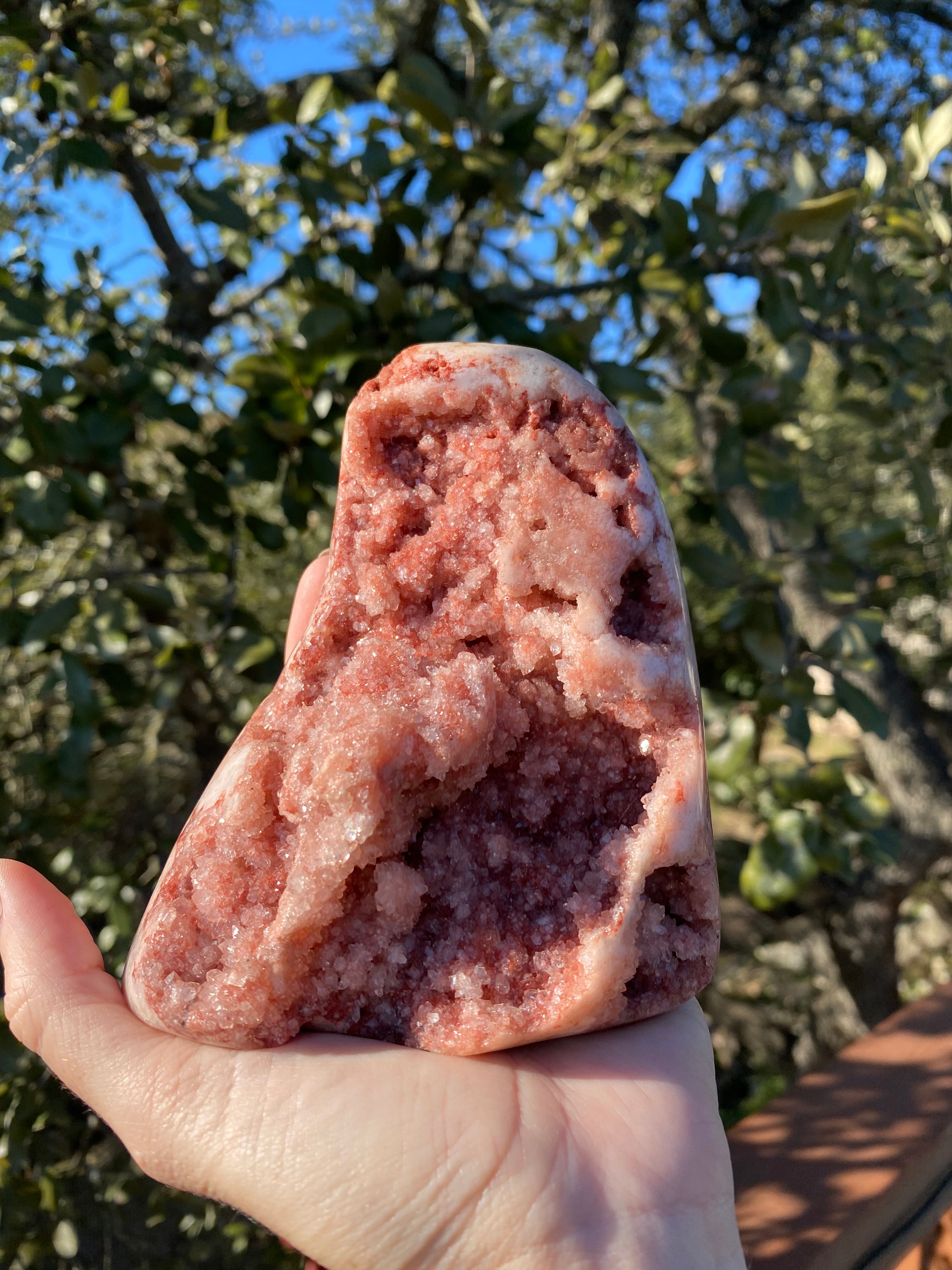 Rose Amethyst Specimen shines under the sun, revealing glittering pink crystals and rose jasper, enhancing its natural beauty