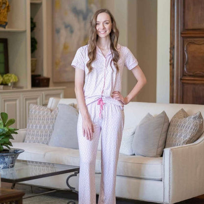 When worn, the Sweetheart Button Up exudes comfort and style, with its soft material and charming heart pattern perfect for any occasion