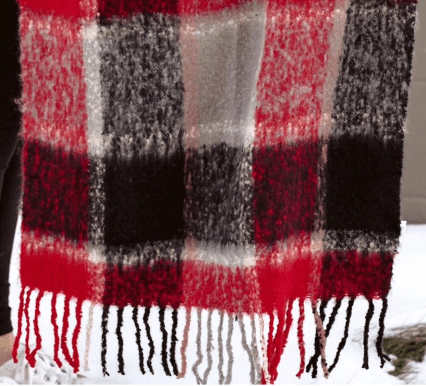 Stay warm and stylish with the Red/Black Lizzy Scarf, a perfect blend of comfort and sophistication for yourself or as a gift