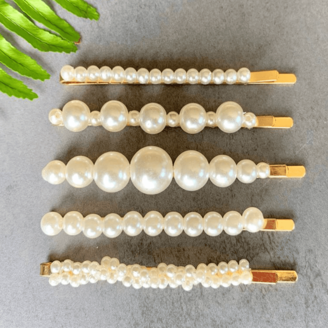 Phoebe Pearl Clips – minimalist pearl bobby pins for versatile hair styling. Use for everyday looks or special occasions
