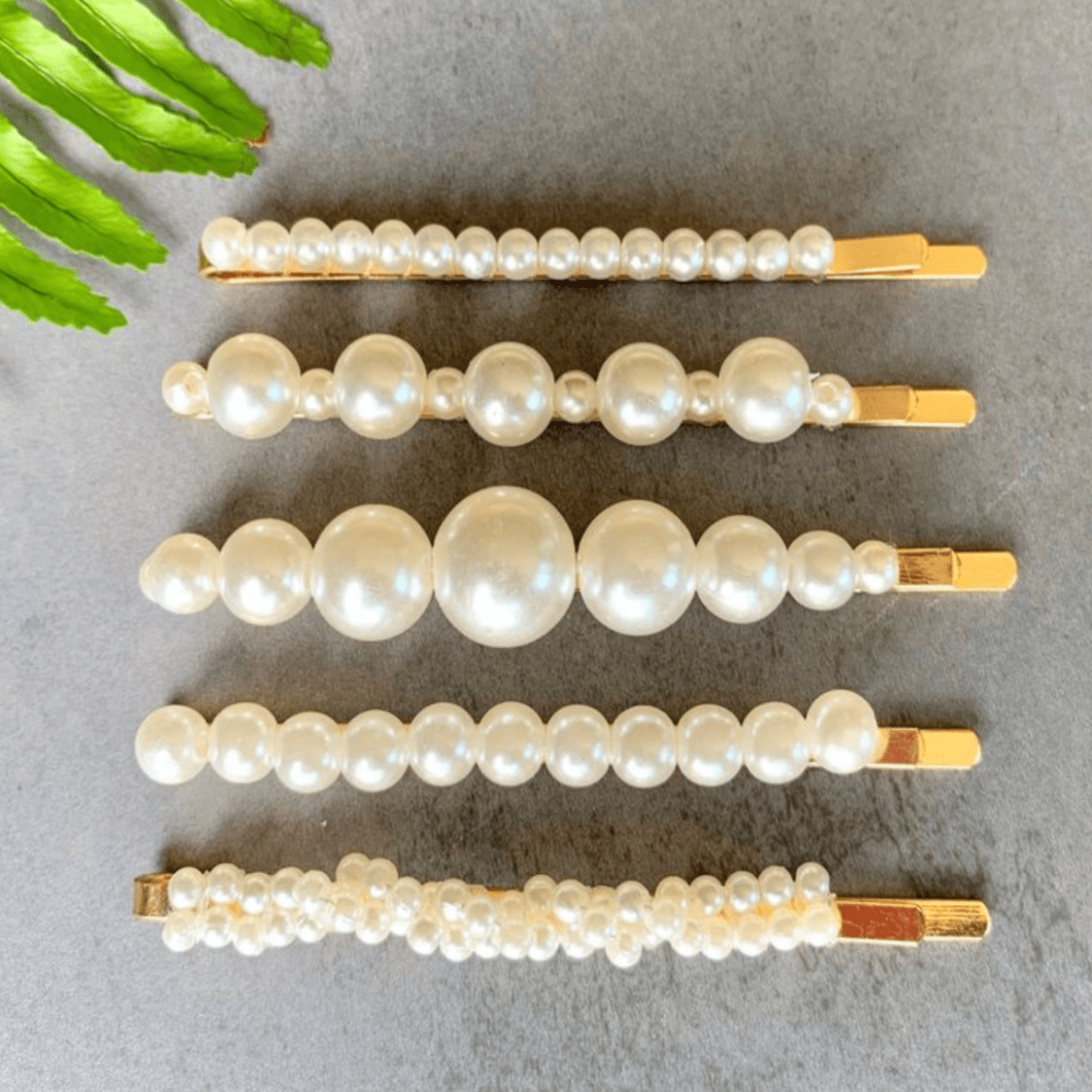 Phoebe Pearl Clips – minimalist pearl bobby pins for versatile hair styling. Use for everyday looks or special occasions