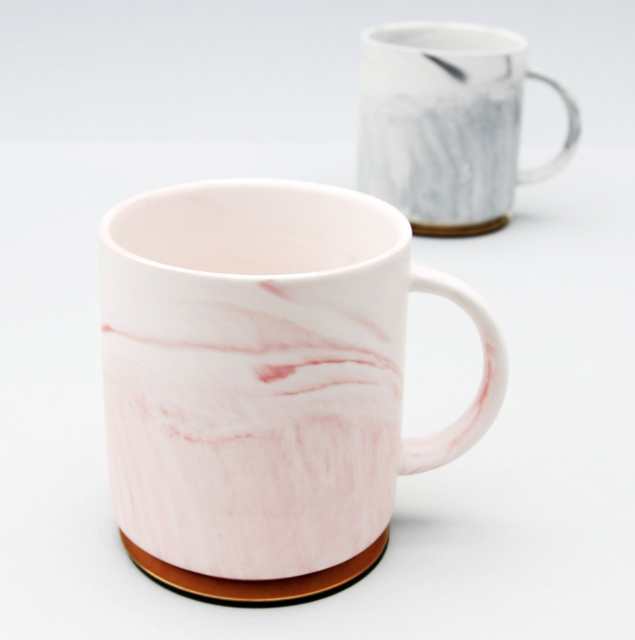 Morning Glory Marble Mug, with a smooth marble finish in pink or grey, perfect for adding a calming, meditative touch to your coffee moments