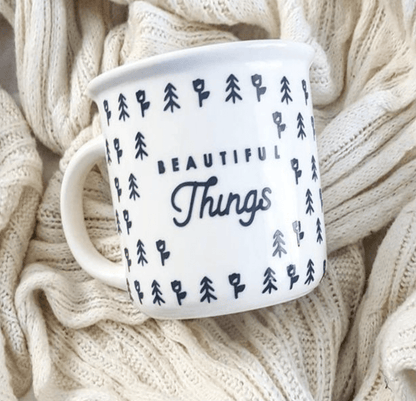 Sturdy 13 oz Beautiful Things campfire mug with large handle, crafted from professional-grade porcelain for outdoor use.