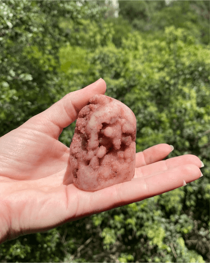 Polished Rose Specimen Crystal with pink crystals in a geode, surrounded by rose jasper, offering peace and stress relief