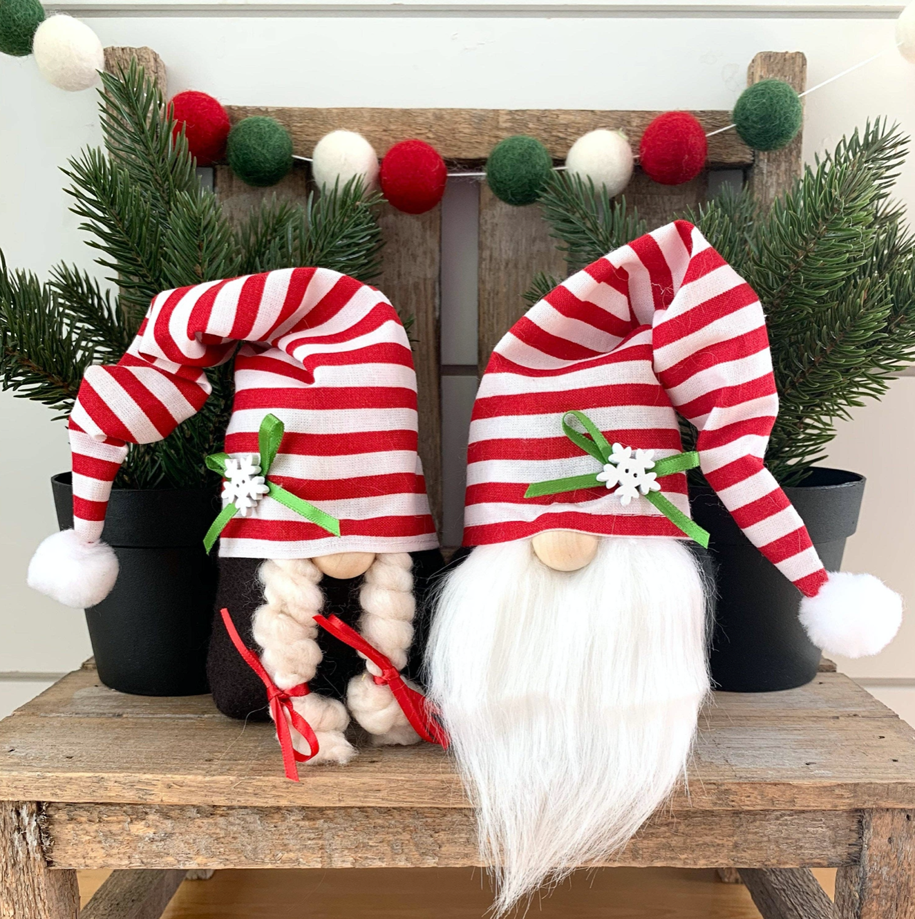 Festive Christmas Gnome, with a weighted base for stability, in cream or red stripe, ideal for adding charm to holiday decor