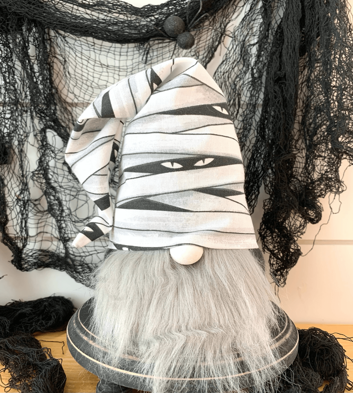 Halloween Mummy Gnome, an adorable and spooky addition to your holiday decor, perfect for bringing festive charm to your Halloween setup