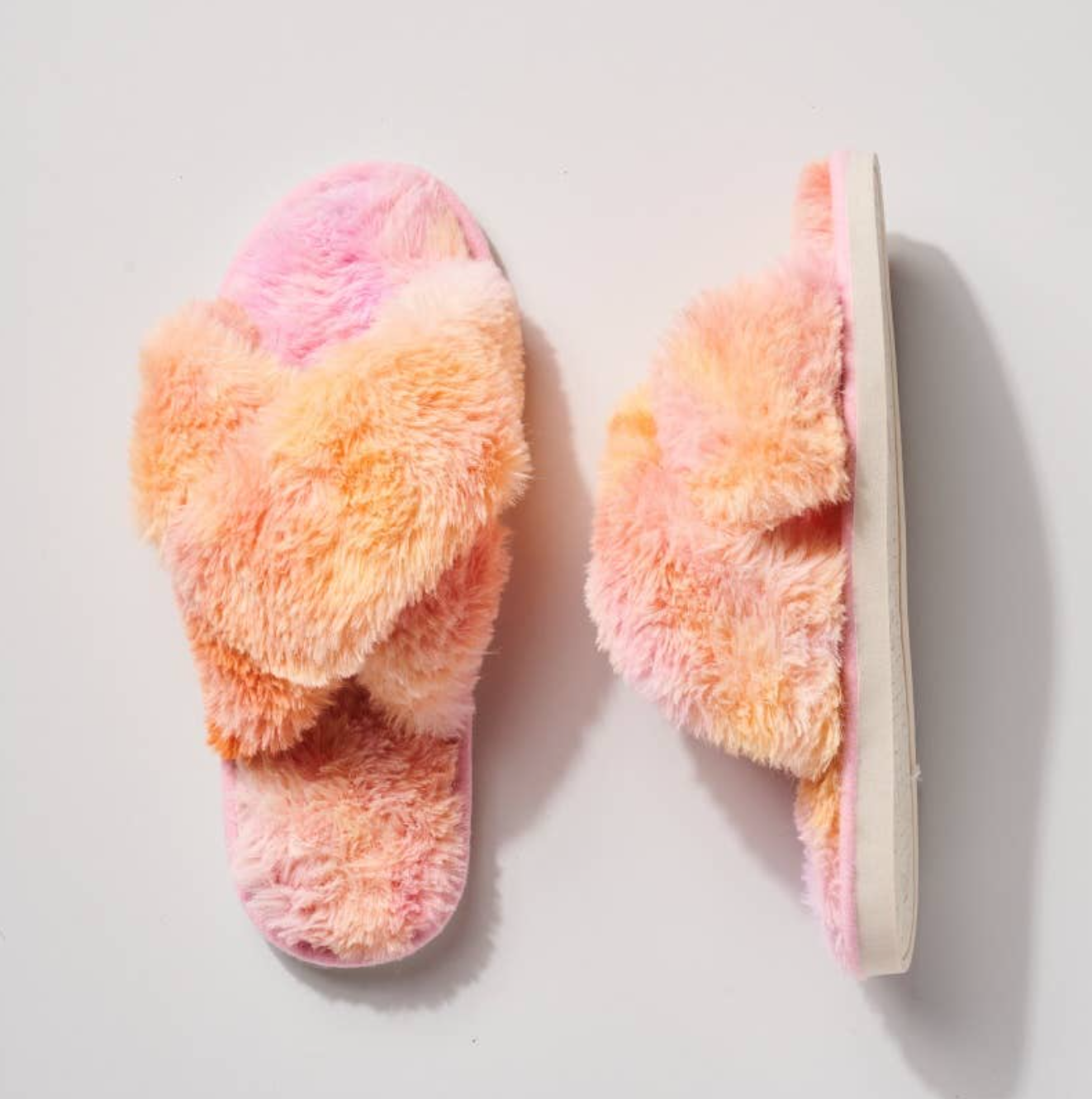 Fluffy Tie-Dye Faux Fur Slippers add comfort and style, ideal for self-care or as a gift for those who love all things soft