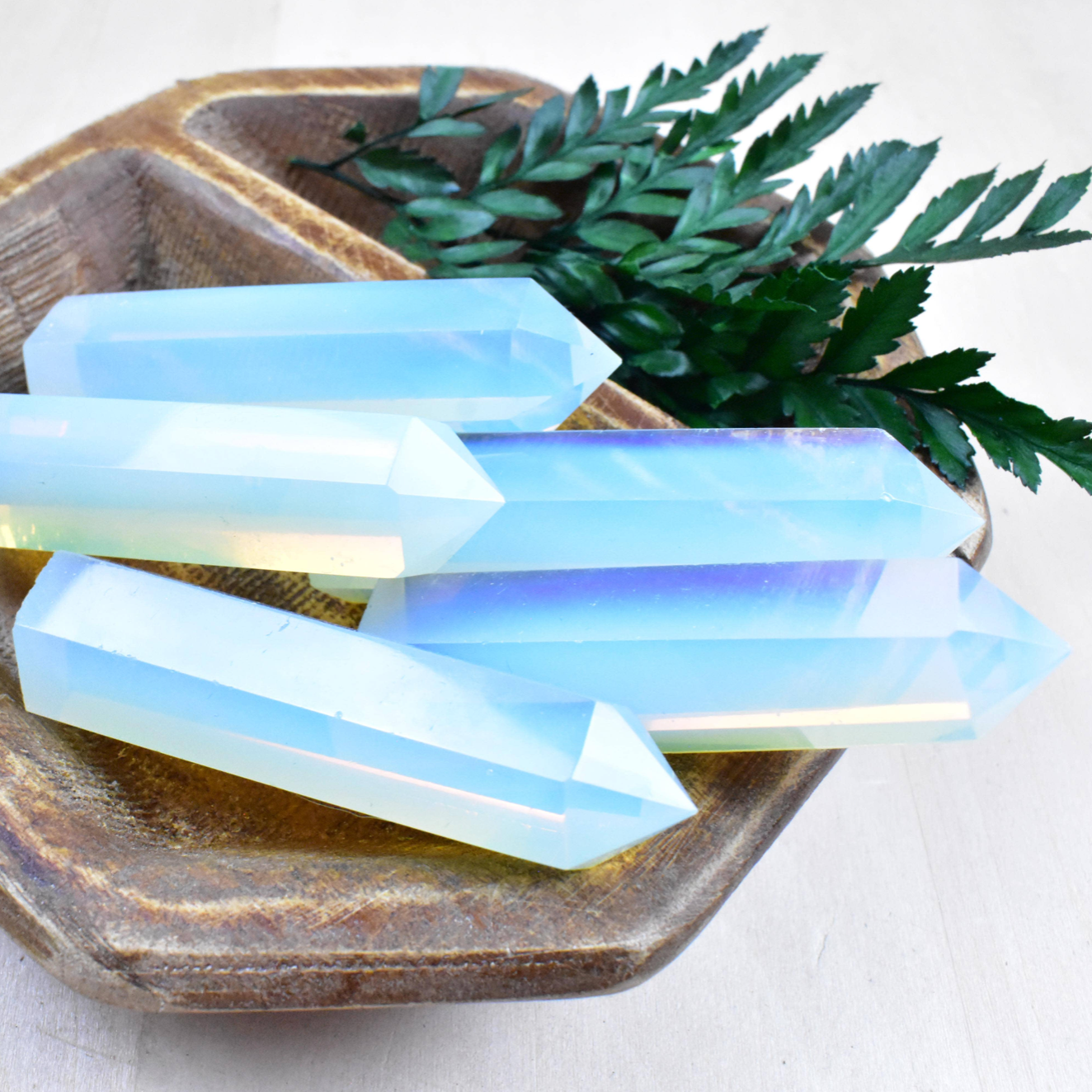 Opalite Point, known for guiding transformation, promotes clarity and emotional balance, perfect for meditation and personal growth