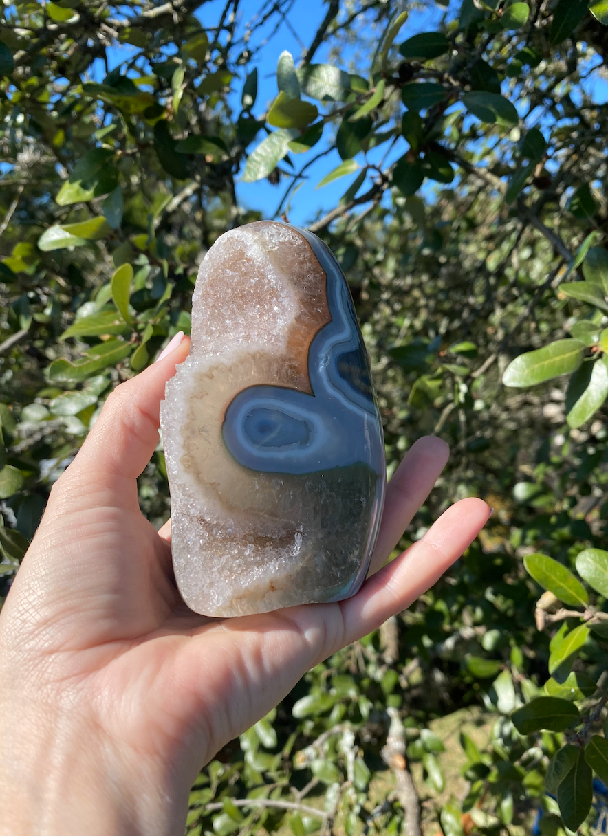 blue agate geode with quartz crystal cover, harmonizing emotional and intellectual energies for physical balance and well-being