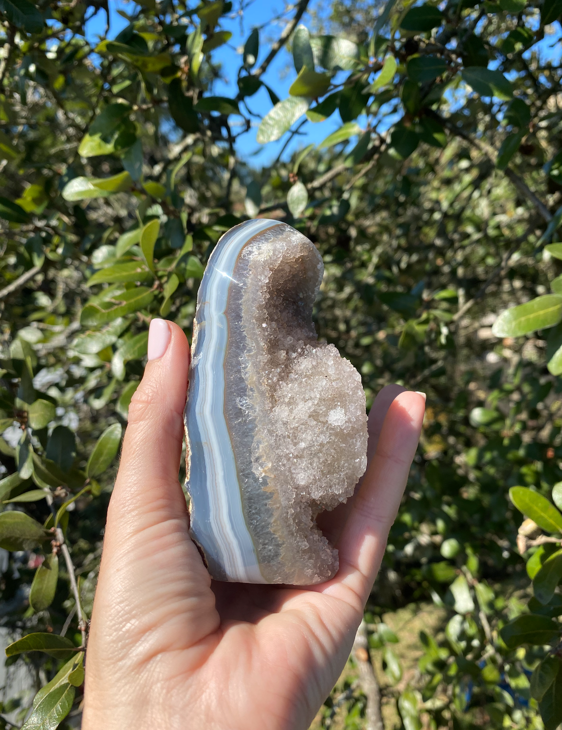 brazilian blue agate with quartz crystals, delicate yet strong, balancing positive and negative energies with natural beauty