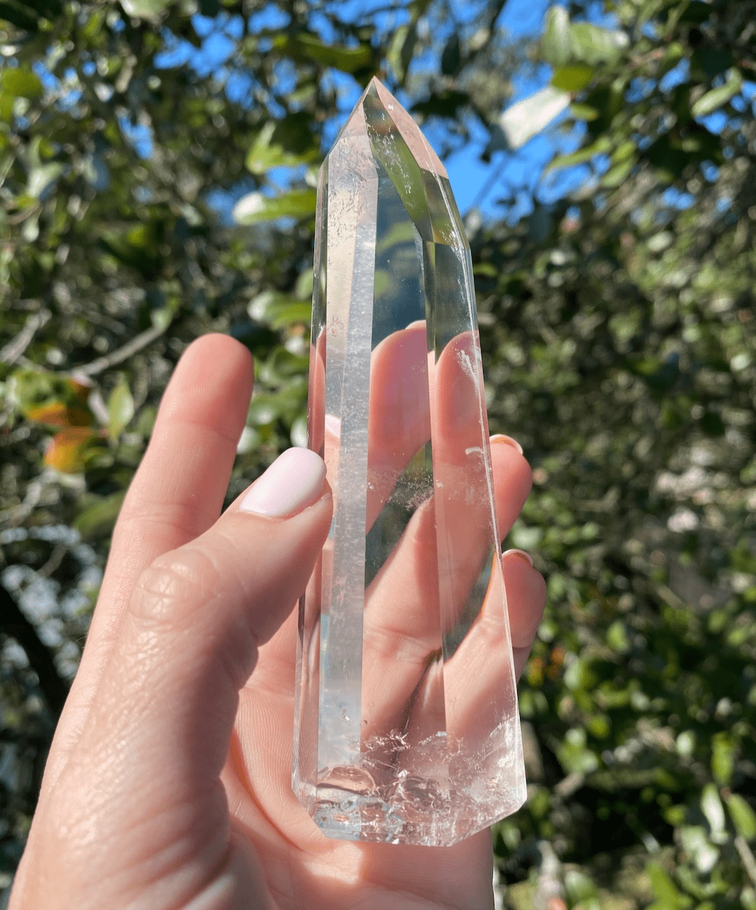 Lemurian Quartz Tower, polished with six sides, offering clarity and inclusions, perfect for healing and purifying energy alignment