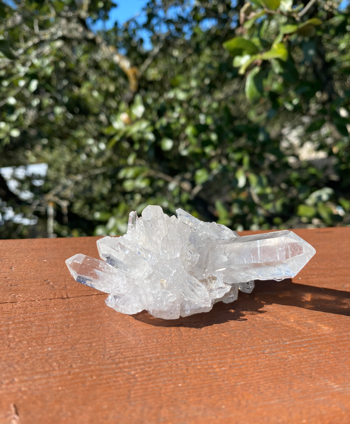 Clear Quartz Cluster with multiple points and inclusions, known for its ability to amplify energy and harmonize vibrations