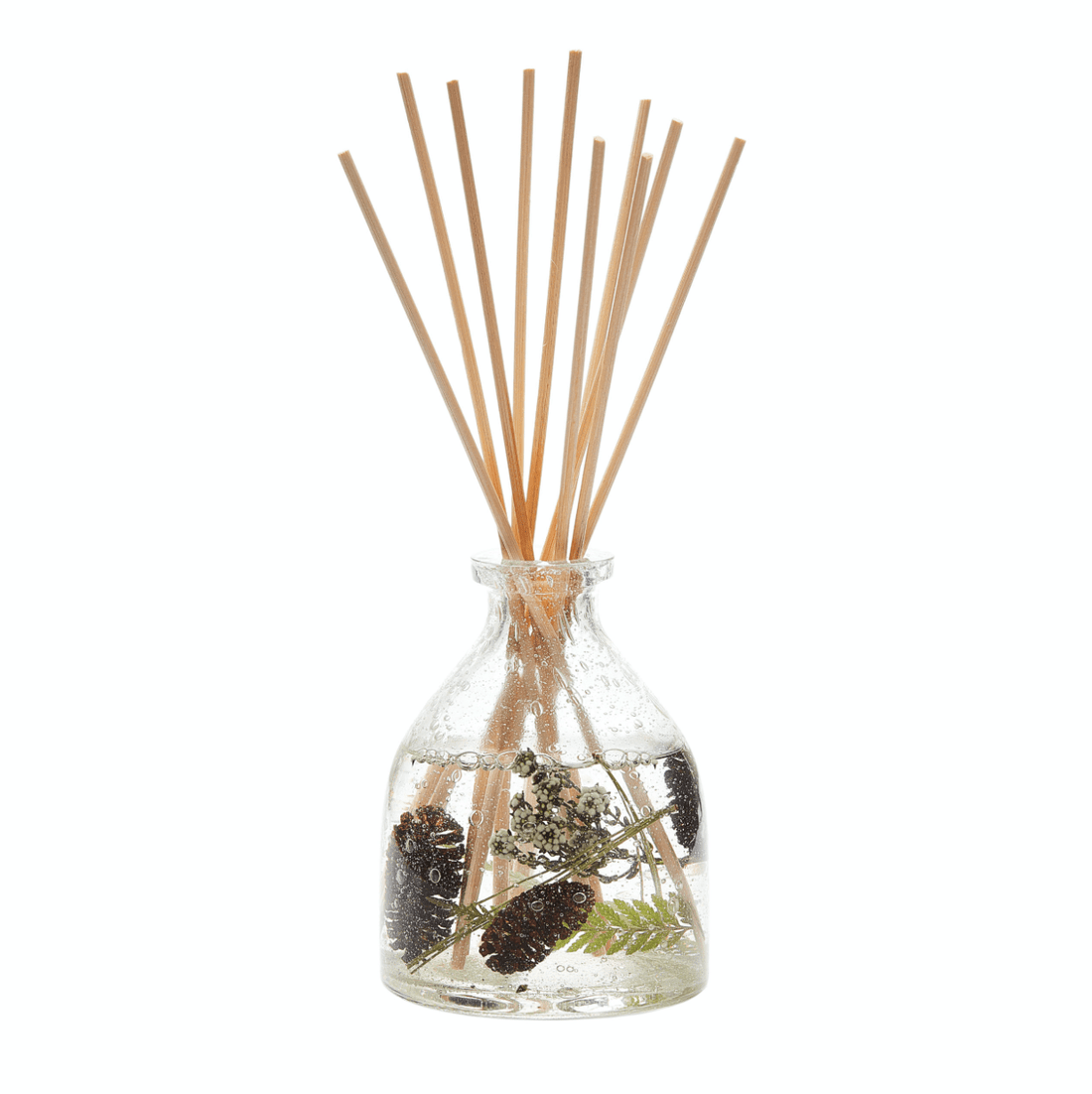 forest botanical diffuser with cedarwood, pine, and sandalwood scent, handblown glass bottle with floating botanicals, lasts 3-6 months