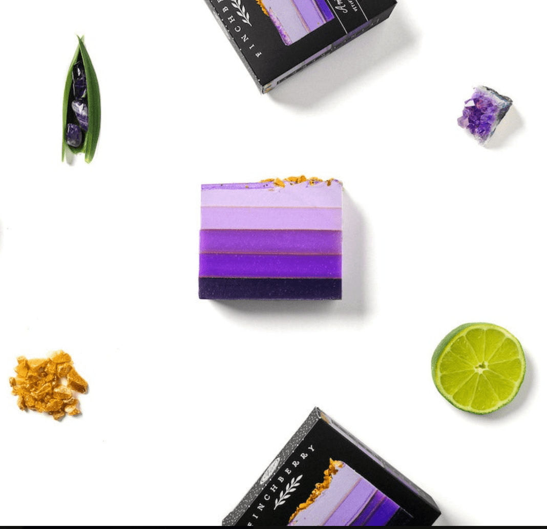 Vegan soap with a violet gradient, featuring earthy vetiver and citrusy bergamot for stress relief and rejuvenation.