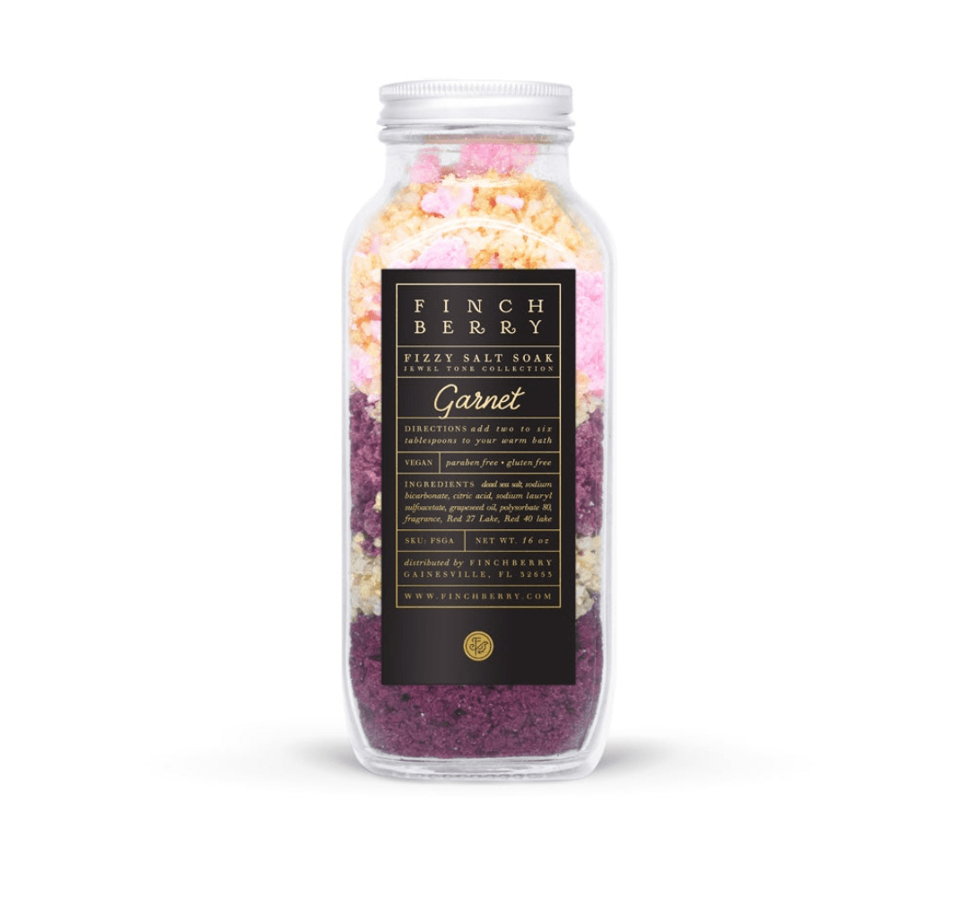 garnet fizzy salt soak with dead sea salt, grapefruit, and lily scent, softens skin and boosts mood, perfect for a luxurious bath experience