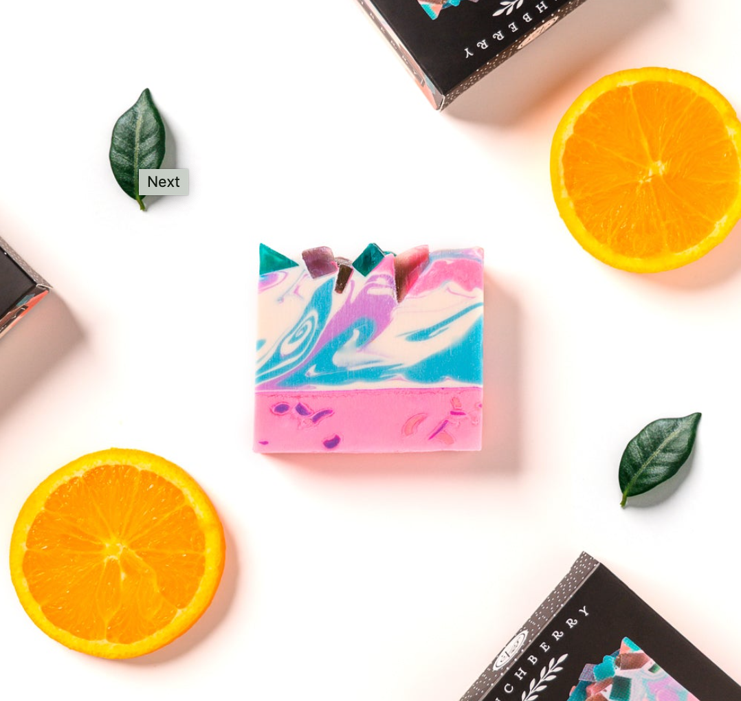 Spark Vegan Soap with vibrant notes of orange, peach, and strawberry, designed to bring happiness and light to your daily routine