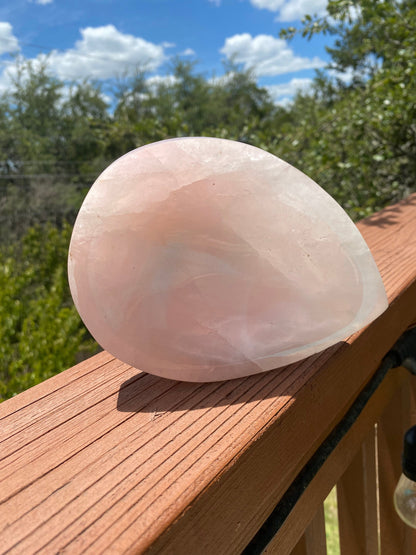 Under the sun, the Rose Quartz Bowl shines with stunning pink tones, a symbol of unconditional love and connection