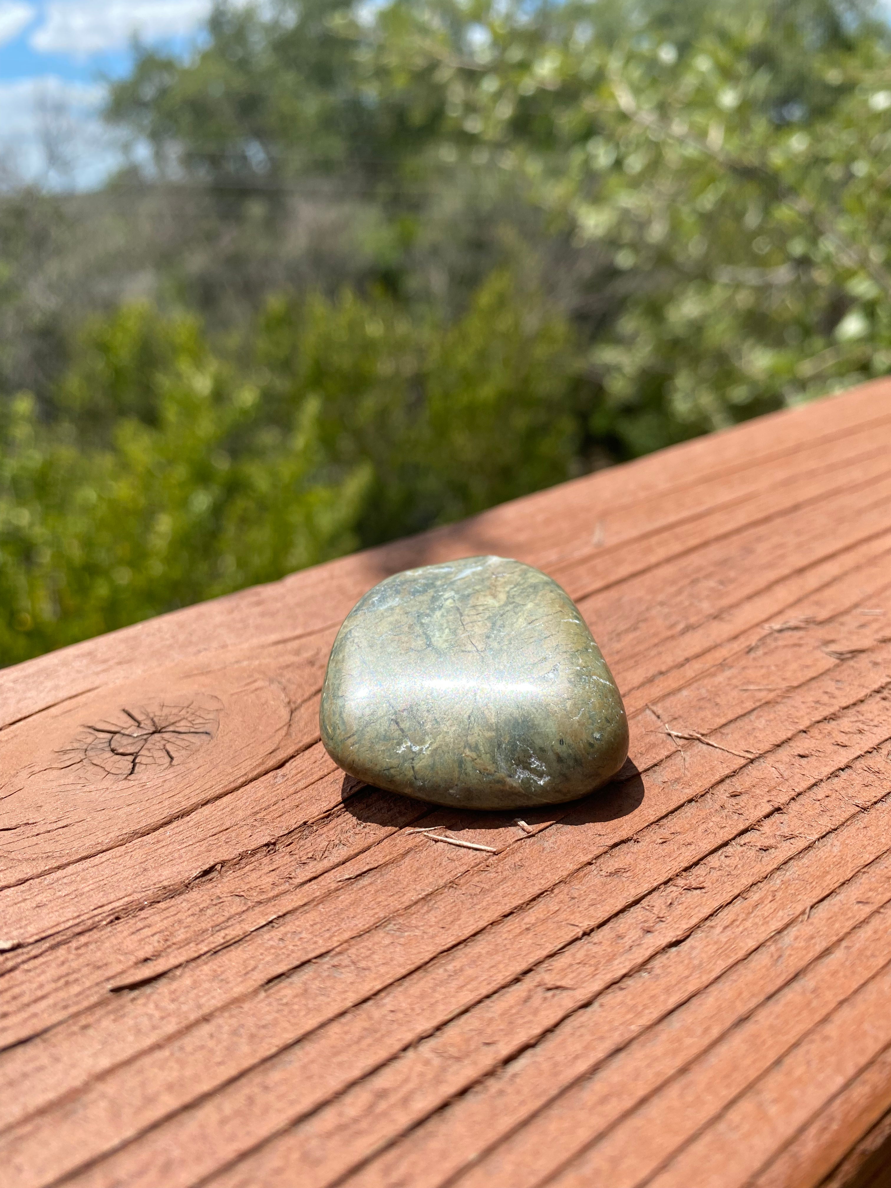 Polished Green Jasper tumble, known for its calming and balancing properties, promotes emotional well-being and peace