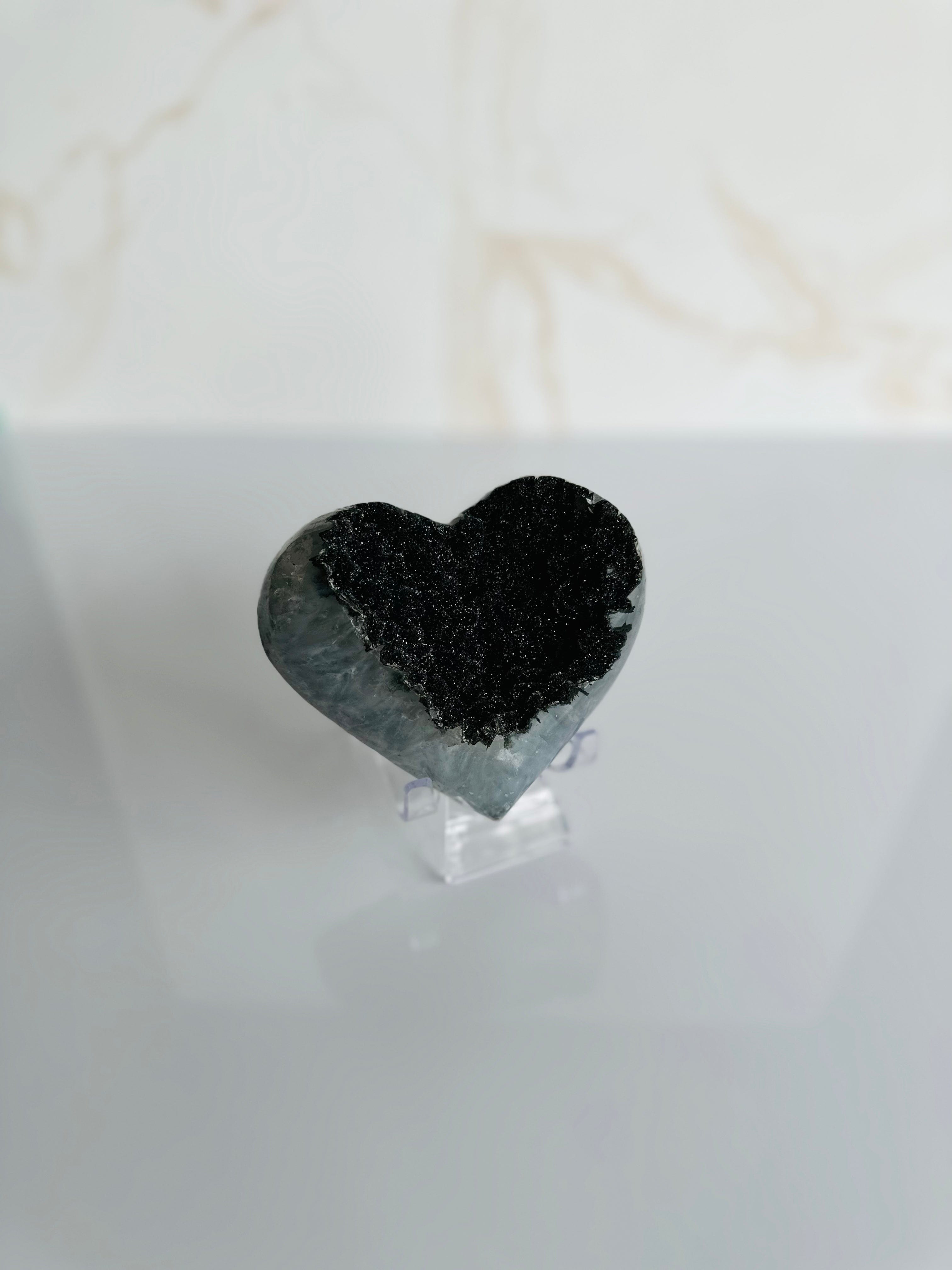 Up close, the Black Amethyst Heart reveals its deep, rich hues, radiating soothing energy for meditation and protection