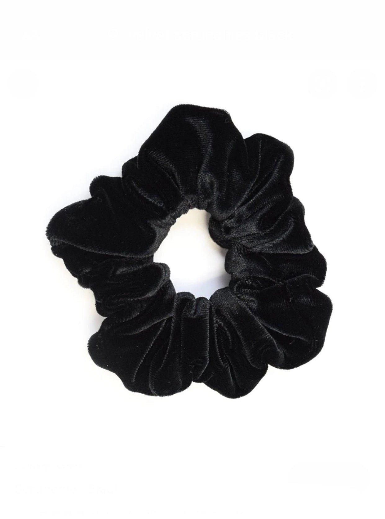 Rochelle Black Velvet Scrunchie offers a secure hold with soft velvet material, perfect for styling a comfortable, chic messy bun