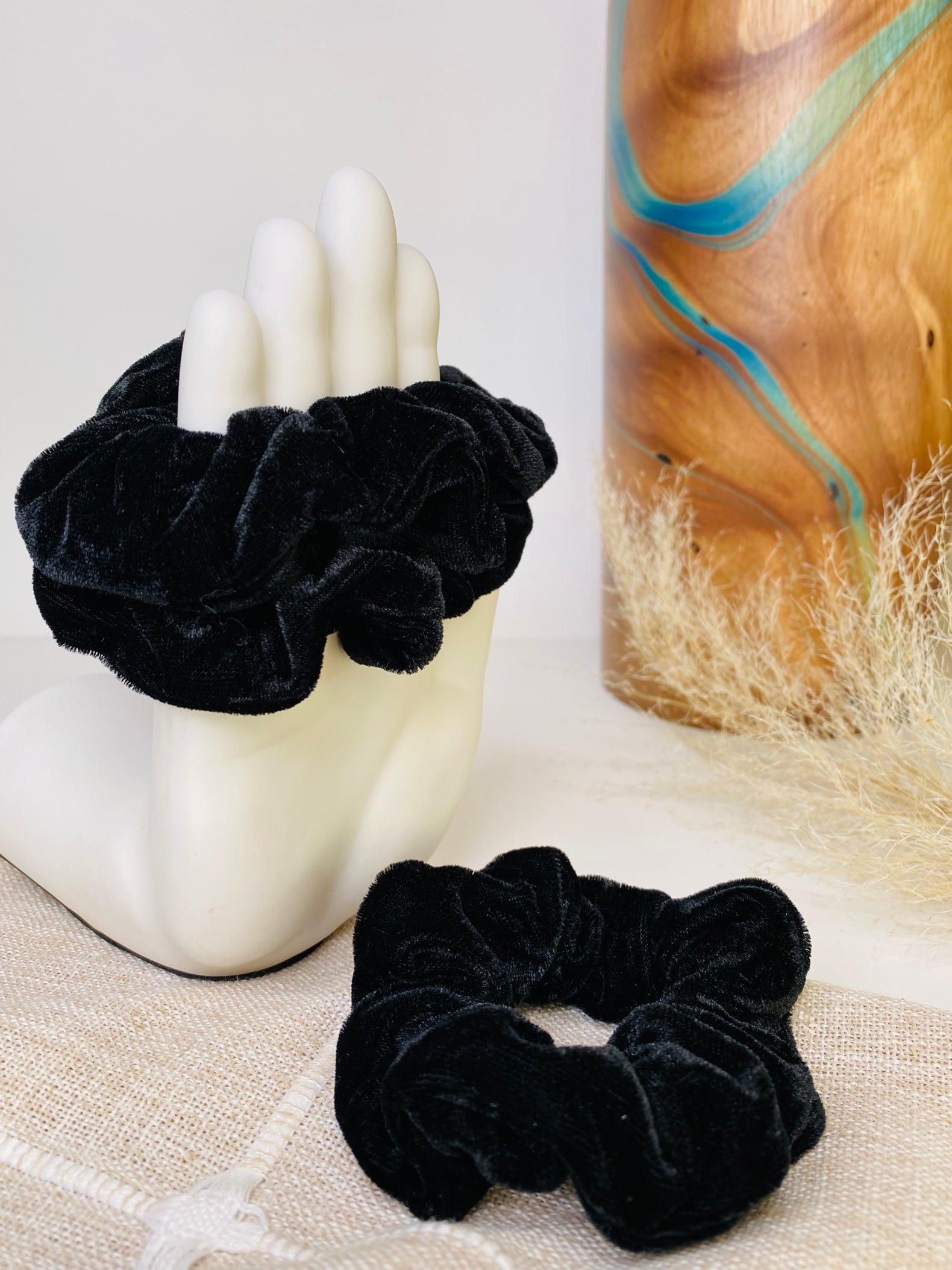 Black Velvet Rochelle Scrunchie, soft and secure, ideal for elevating your messy bun while keeping your hair in place all day