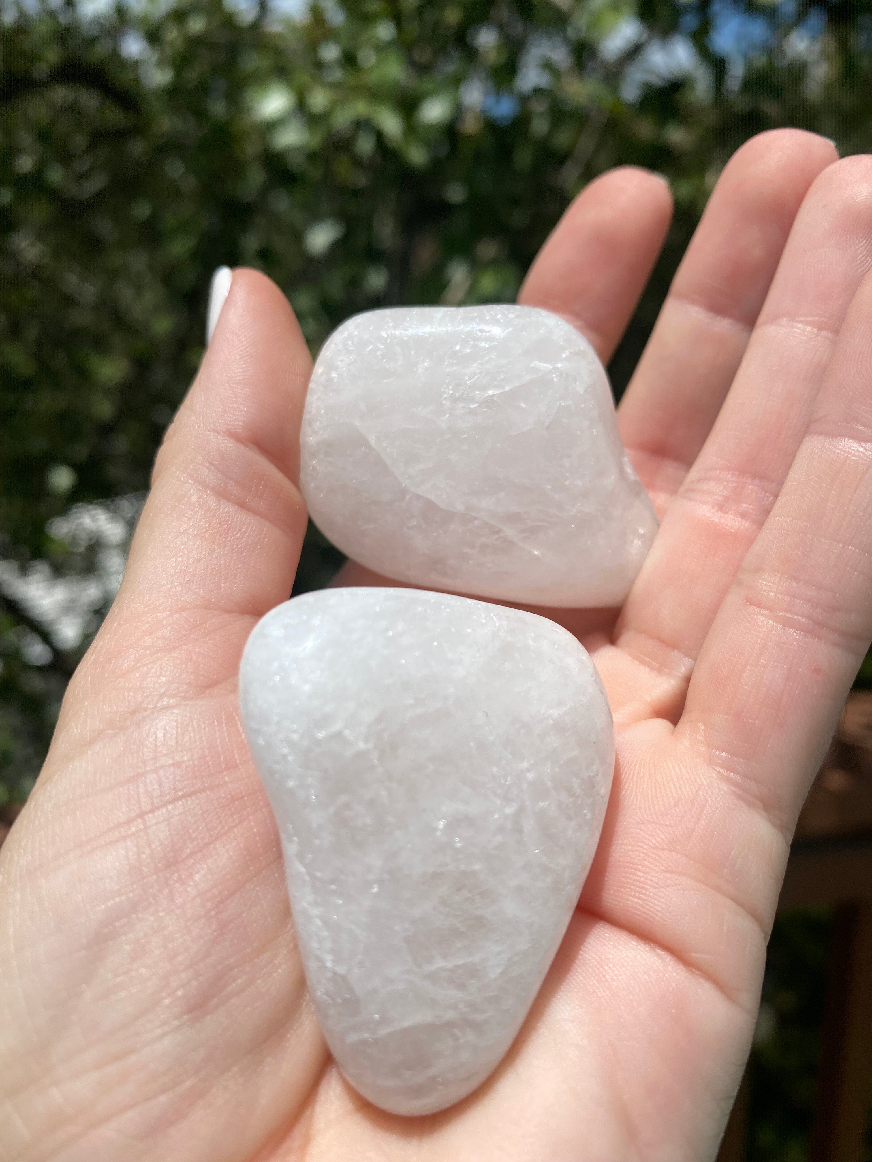 Held up close, the Snow Quartz Tumble reveals its stunning clarity, promoting emotional stability and patience while cleansing all chakras