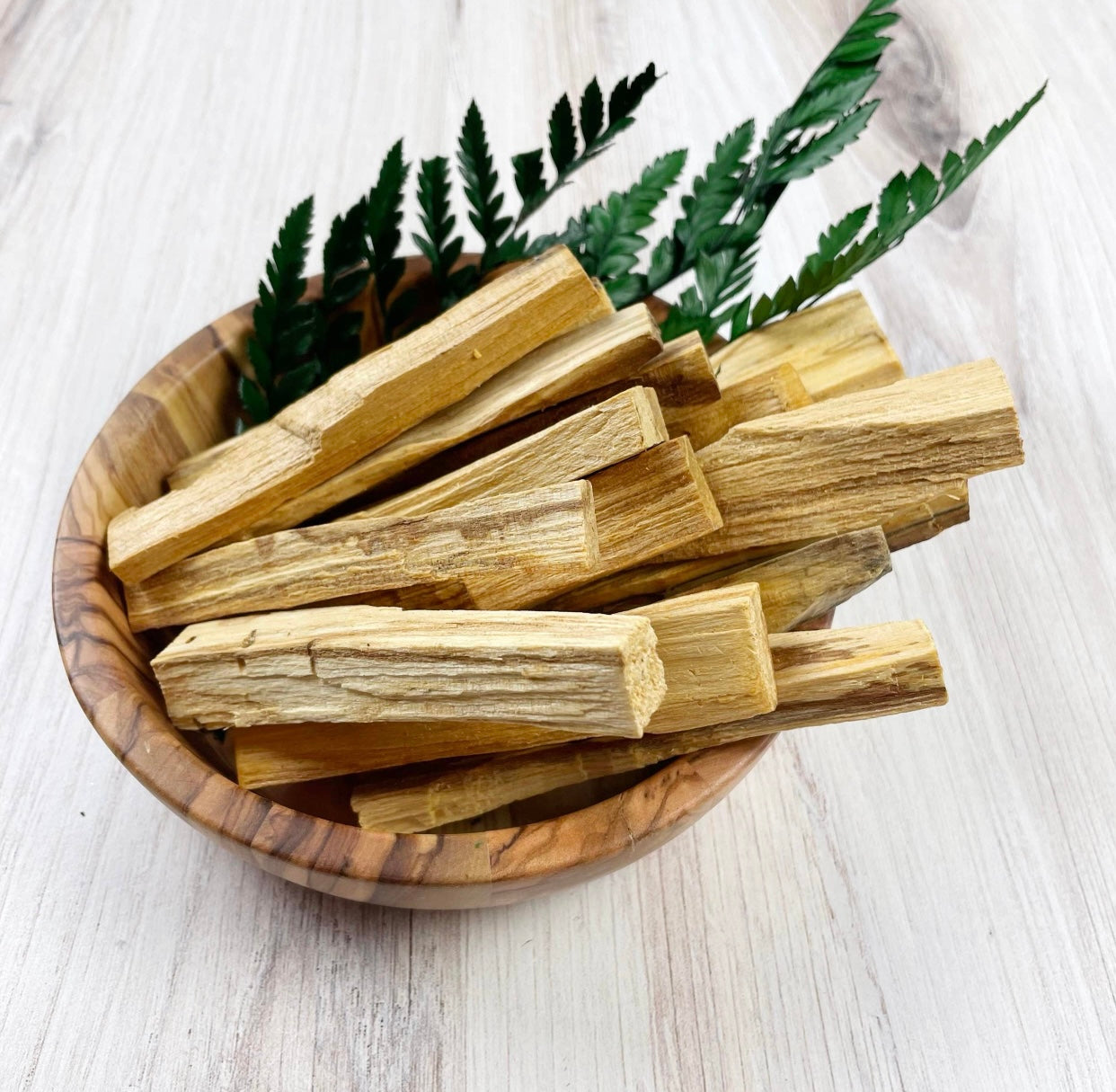 Sustainably-sourced Palo Santo Bundle, perfect for cleansing spaces, crystals, and self, promoting healing, creativity, and spiritual clarity