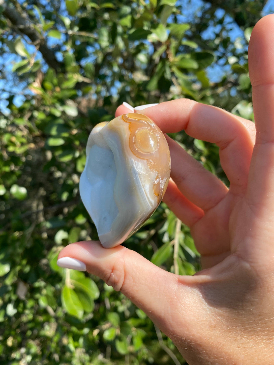 Snow White Microcrystalline Agate Heart with gold, tan, and cream bands, polished to perfection, enhances focus, clarity, and perception