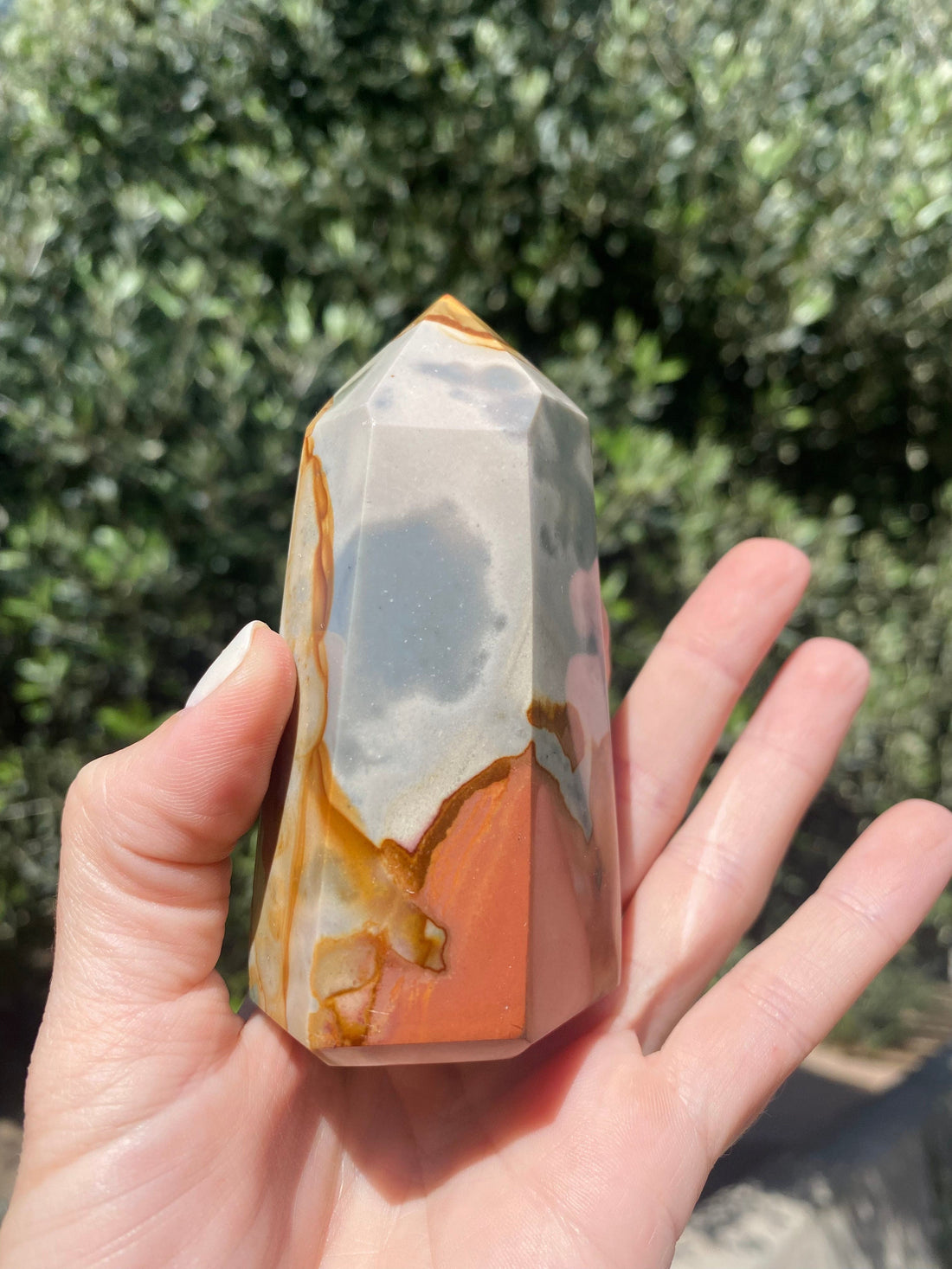 Feel serenity and grounding energy as you hold the Uruguayan Jasper with Agate Crystal Tower, perfect for meditation