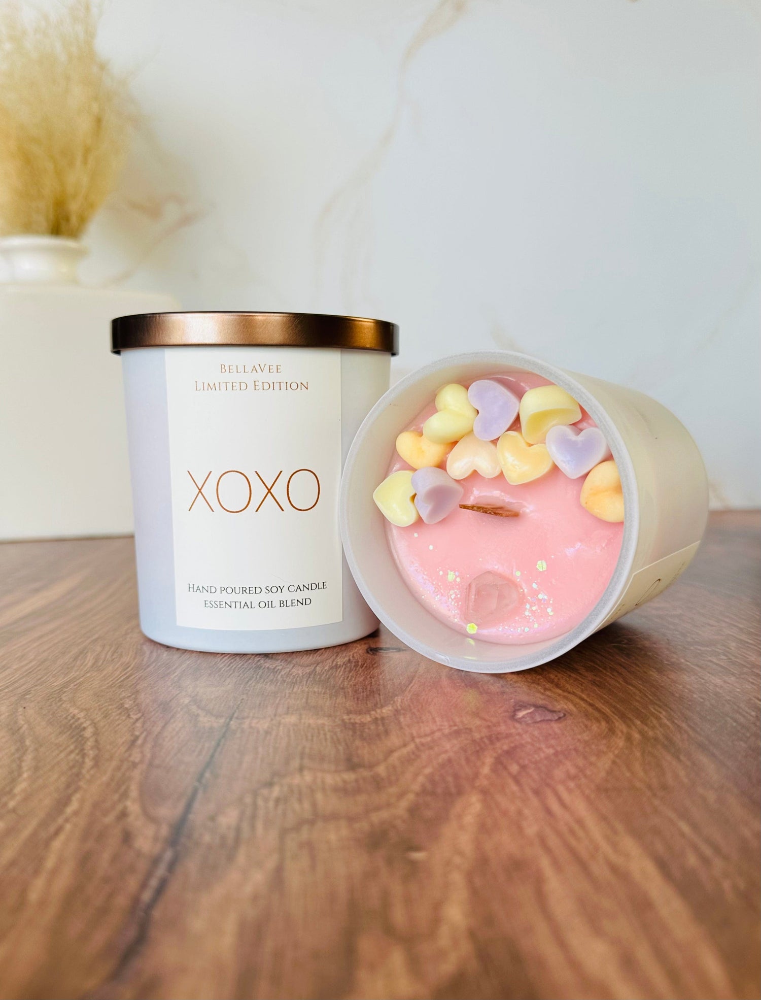 The XOXO Candle features colorful hearts on top, adding a fun, festive touch to this one-of-a-kind Valentine’s Day candle