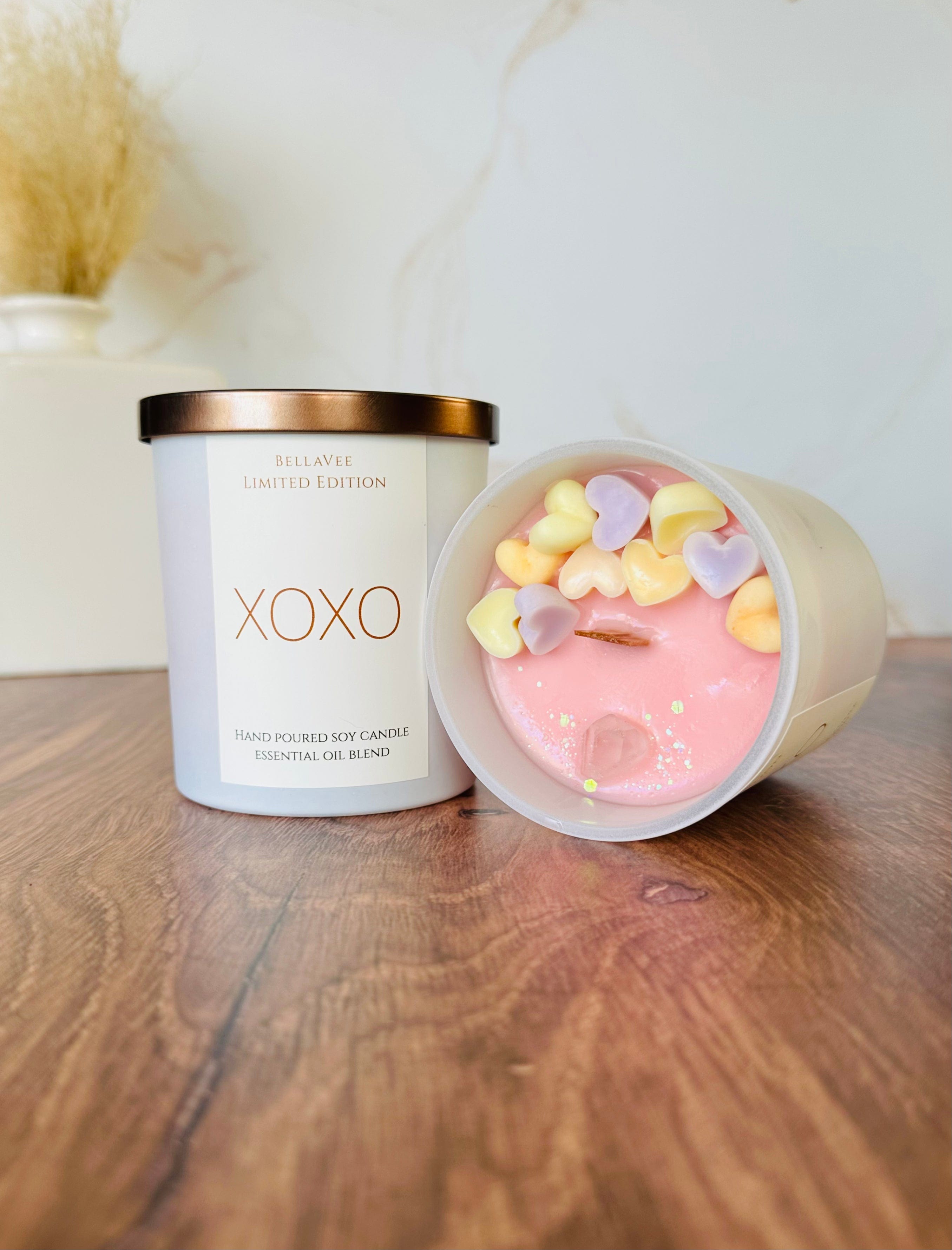 The XOXO Candle features colorful hearts on top, adding a fun, festive touch to this one-of-a-kind Valentine’s Day candle