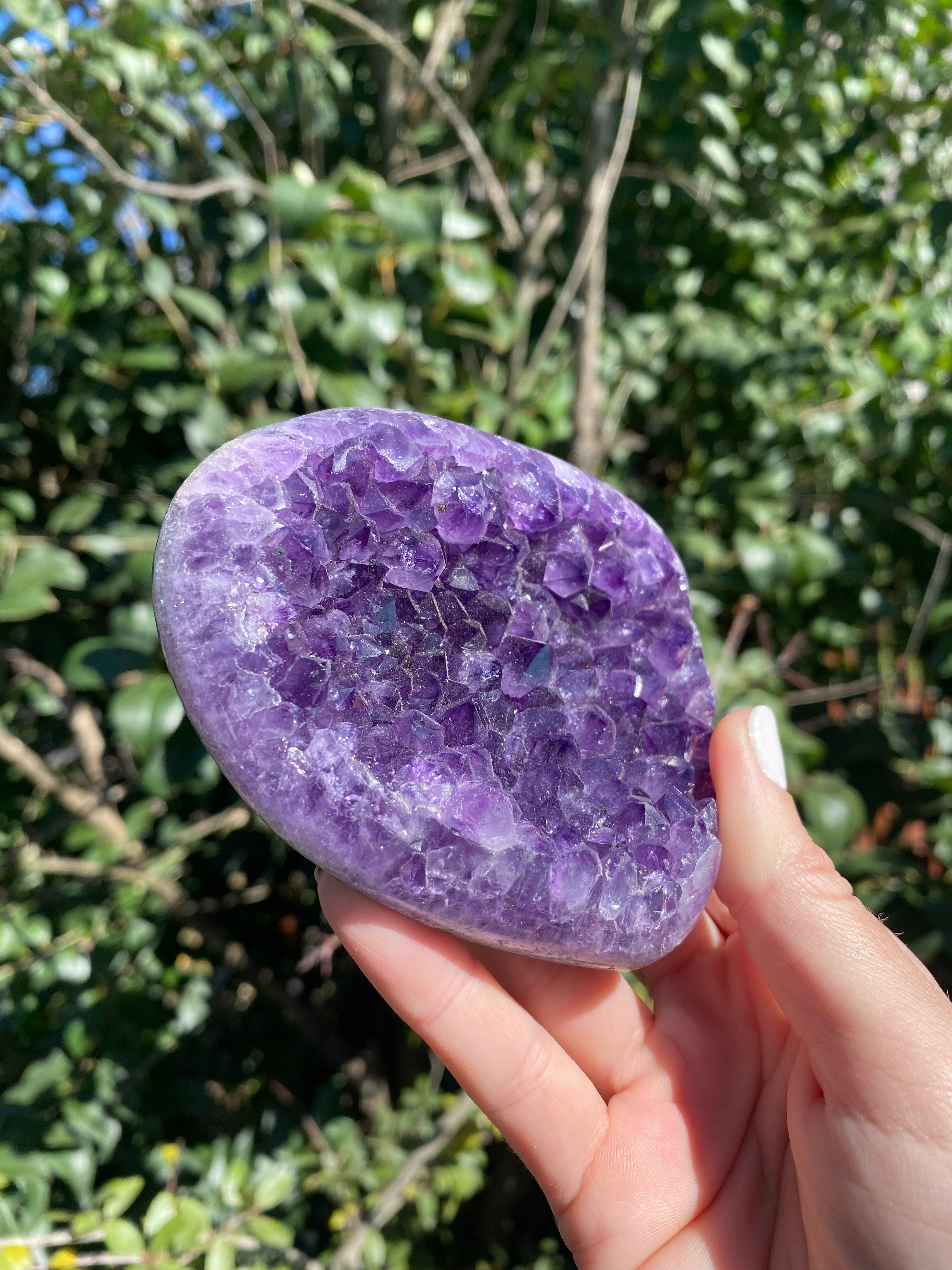 Green Agate Banded Amethyst: Uruguayan Amethyst framed by green Agate, known for its stress-relieving, healing, and cleansing powers