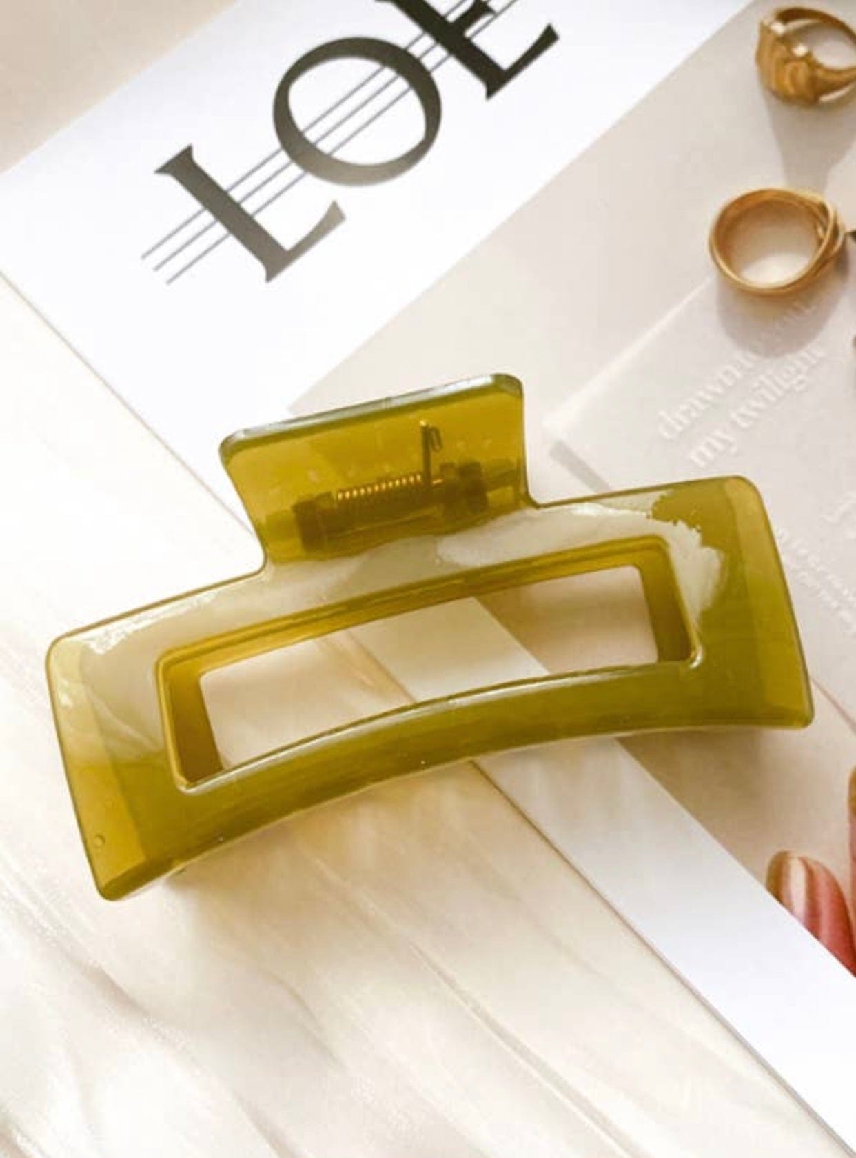 Olive Jelly Claw, perfect for holding thick hair securely with a stylish retro design. Add this to your favorite bundle!