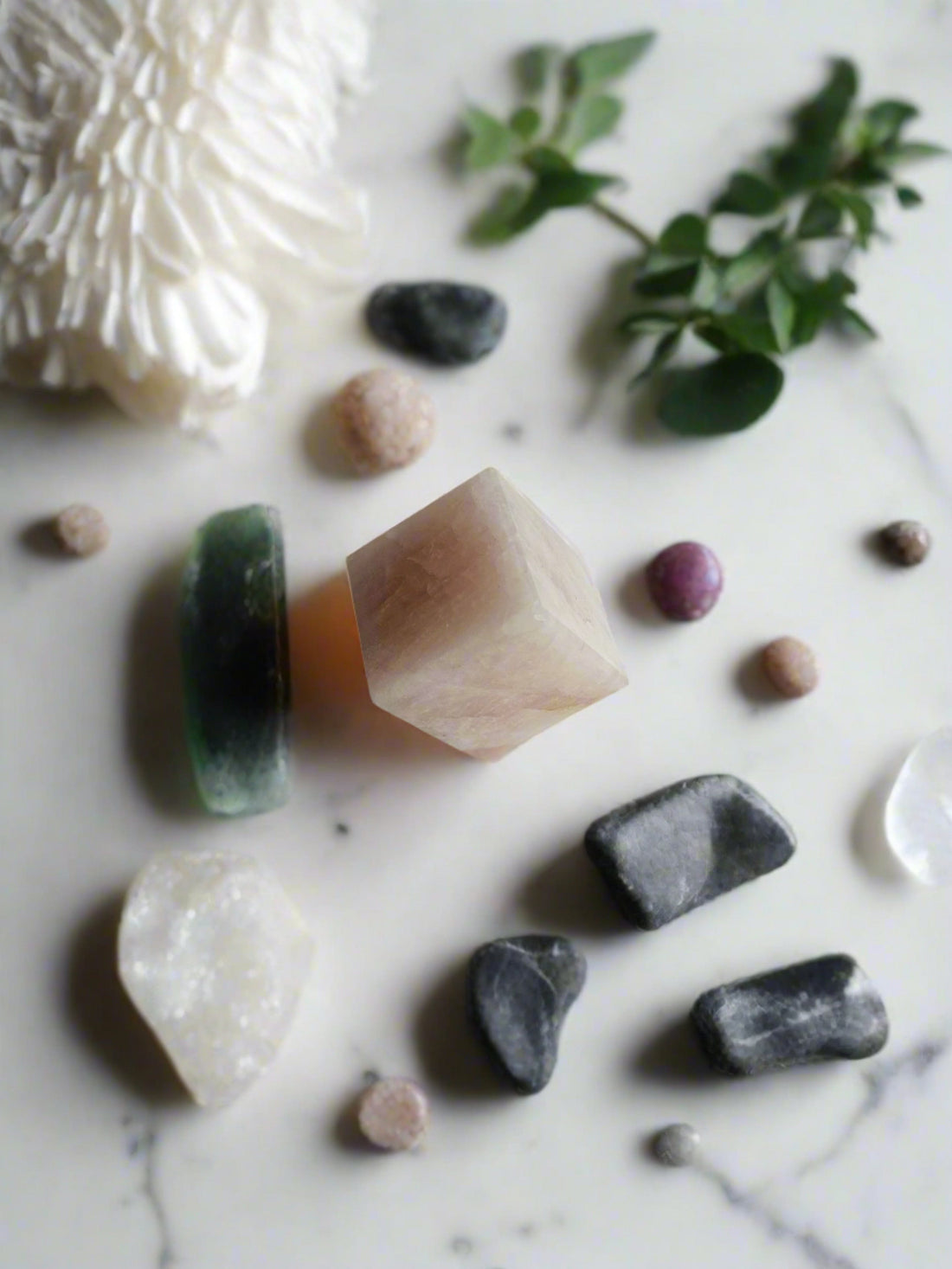Rose Quartz Cube sits beautifully alongside other crystals, radiating love and compassion, making it a perfect addition to any collection