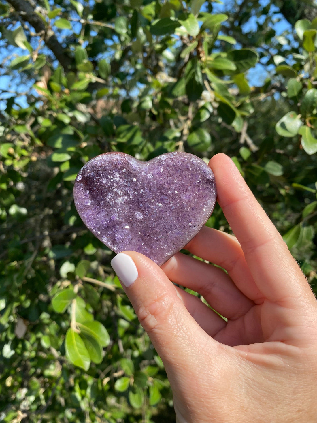 Amethyst crystal heart with blue and red Brazilian Agate banding, known for dissolving negative energy.