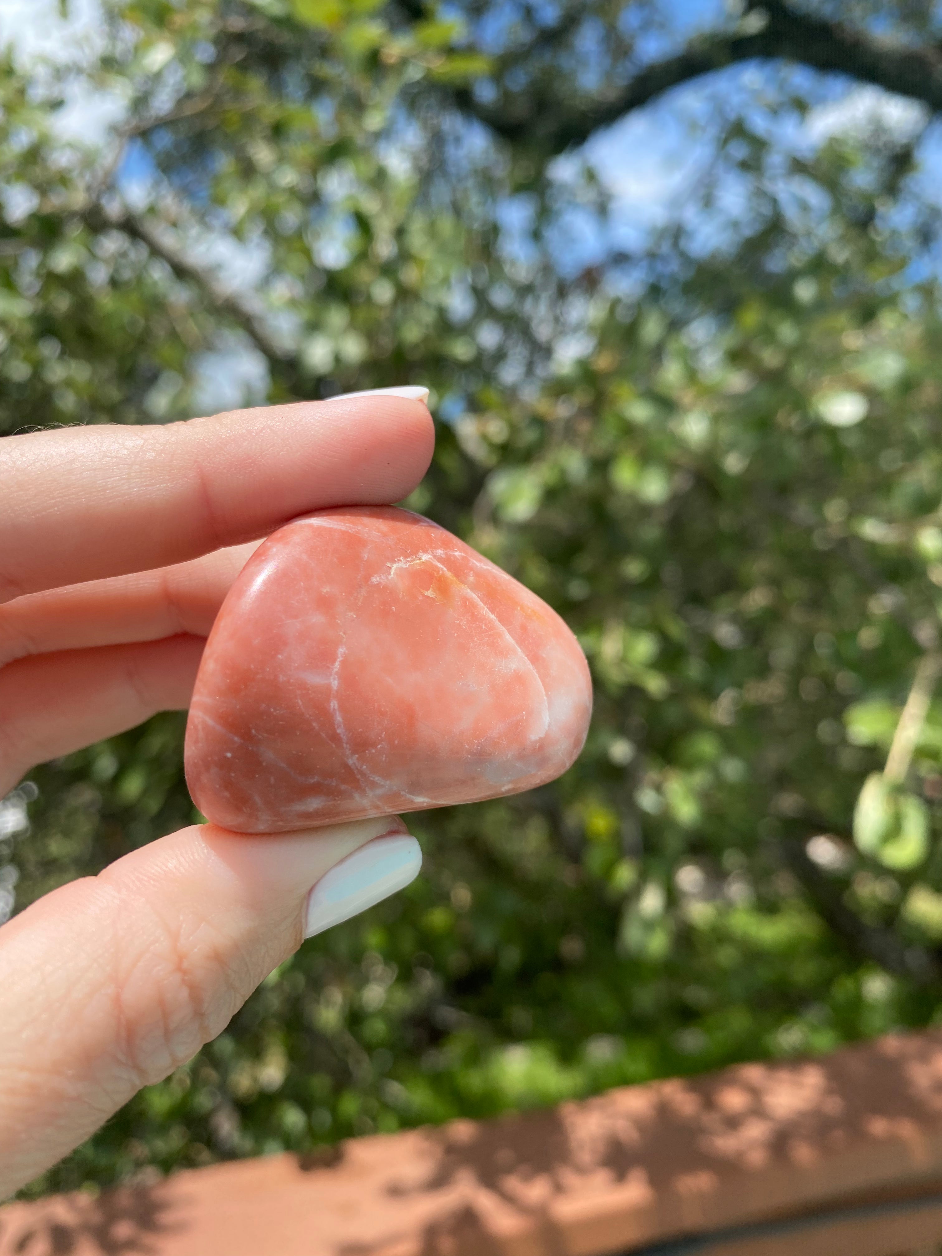 Red Aventurine Tumble motivates action, dispels negativity, and aligns energies, linked to the root chakra and Aries zodiac