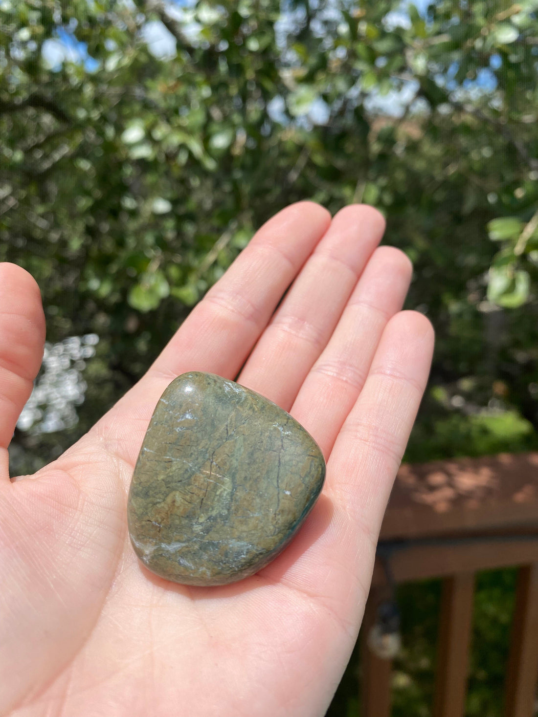 Green Jasper tumble stone, known for its balancing energy, promotes inner peace and positivity, ideal for emotional and spiritual harmony