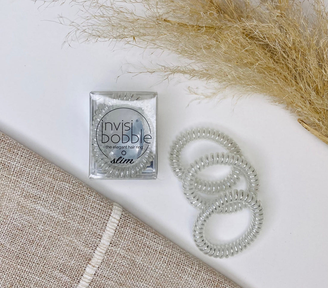 Invisi-Bobble Slim hair ties, no-pull design, perfect for all hair types, offering an elegant look and ideal as a gift