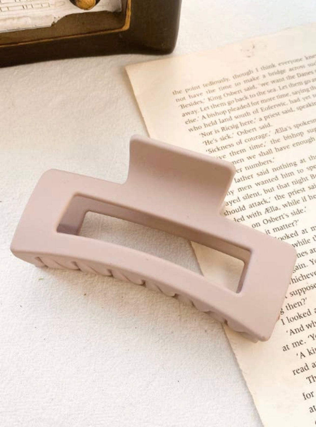 Soft pink Sophie Matte Claw clip with a matte finish, strong hold for thick hair, a stylish addition to your self-care routine
