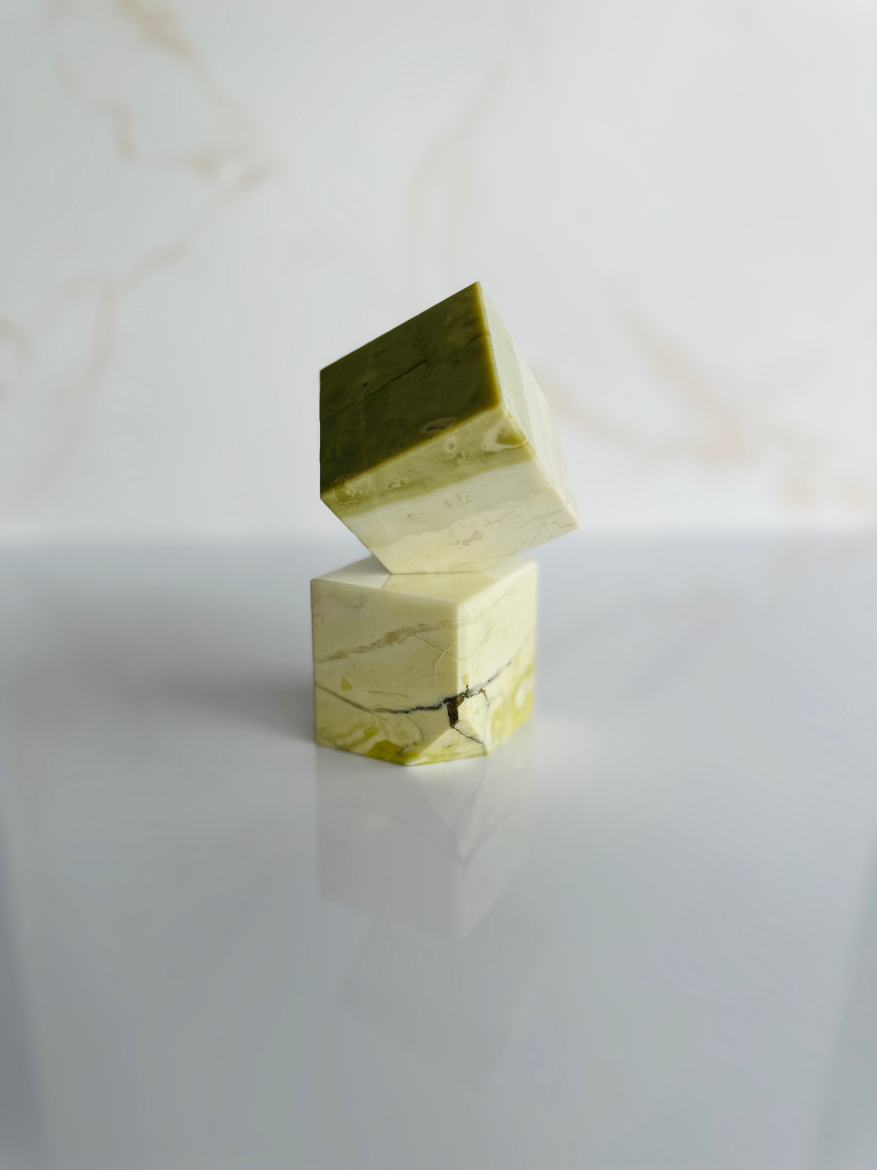 Serpentine Cube, a grounding stone known for its soothing energy, helps clear and rebalance the body during meditation