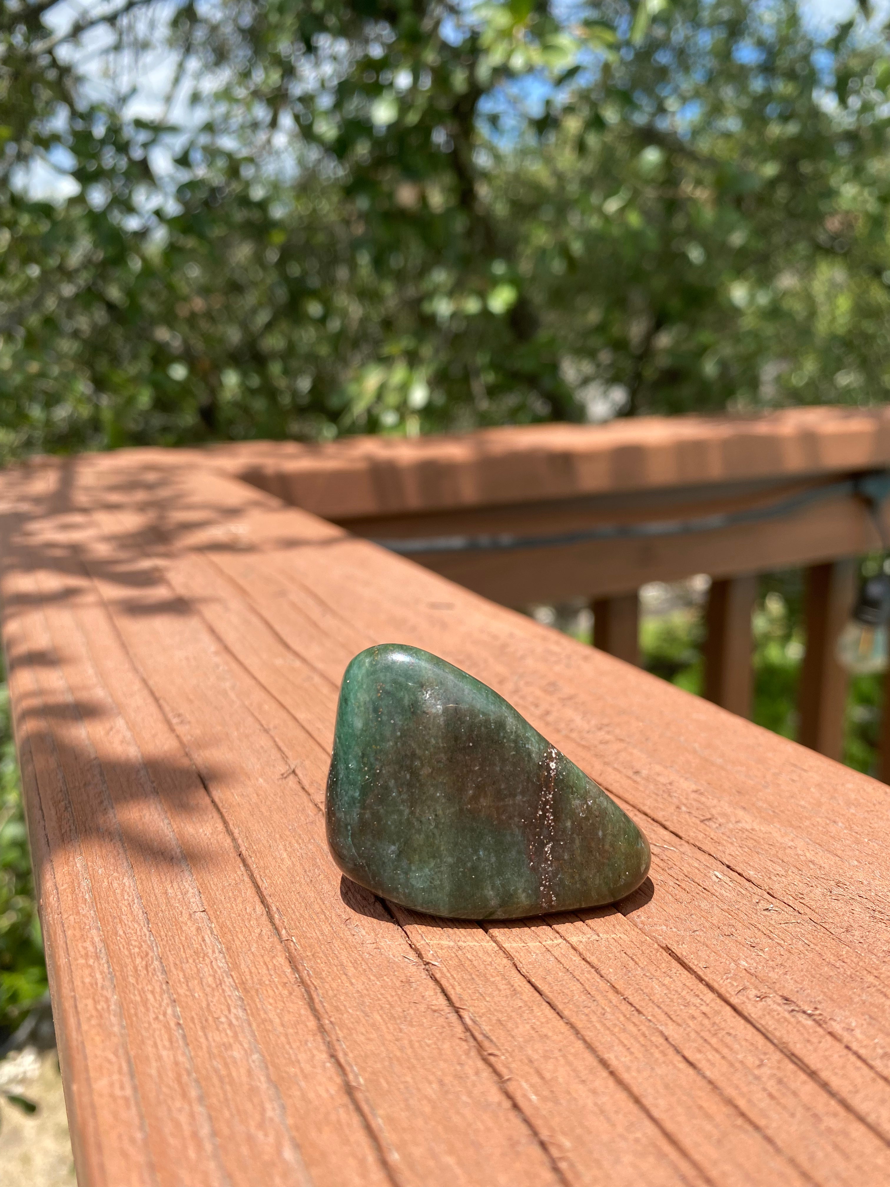 Green Jasper tumble, a 'Peace Love Crystal,' encourages positivity and inner peace, perfect for restoring balance and harmony