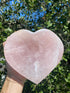 Rose Quartz Polished Heart Bowl glows under the sun, revealing its soft pink hues, symbolizing universal love and compassion
