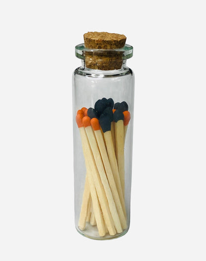 Candle Essentials matches with striker in bold Halloween orange and black, perfect for adding a festive touch to your candle lighting