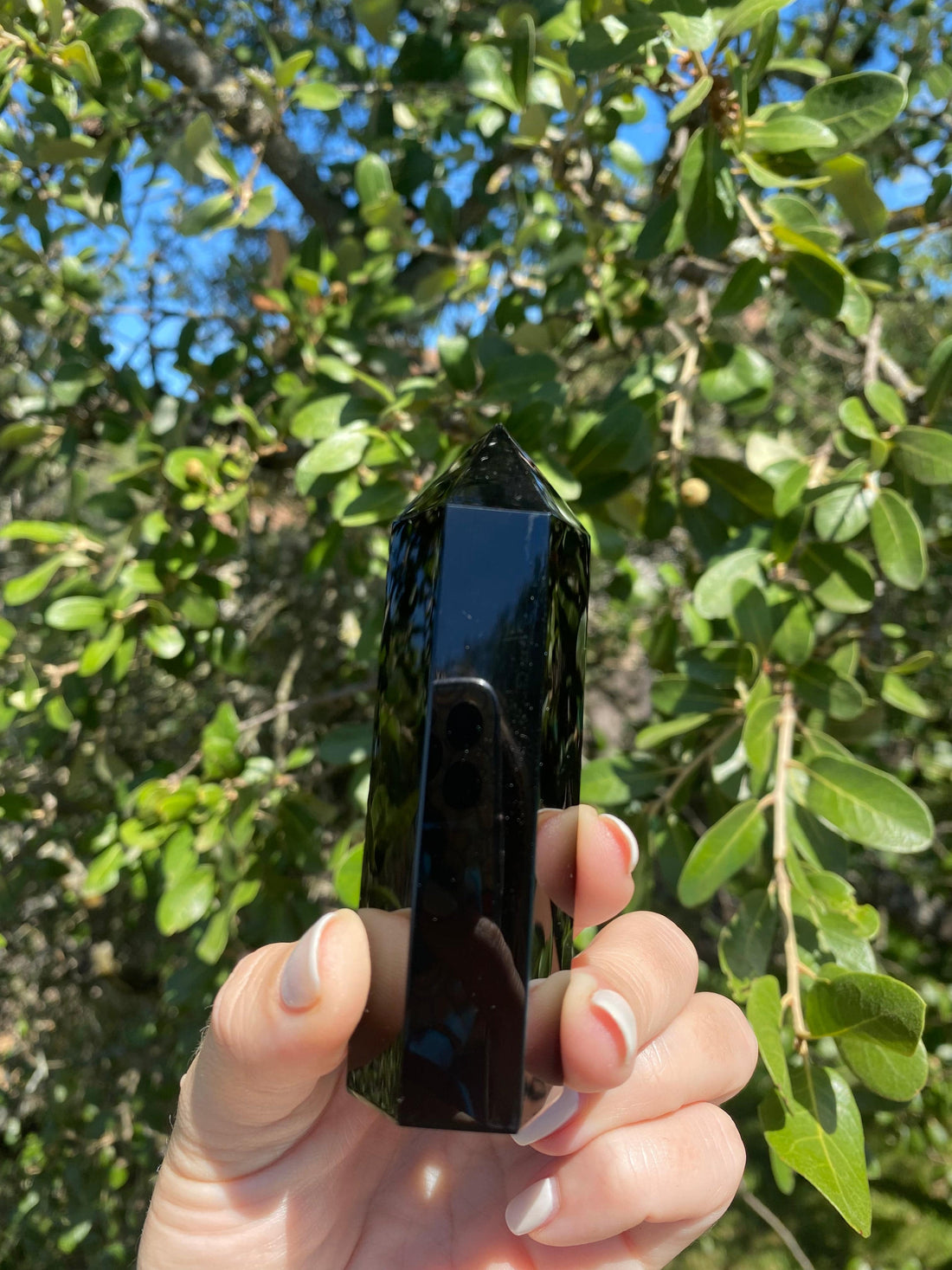 Beautifully polished Obsidian Tower, connected to the root chakra, absorbs negative energy, and helps dissolve emotional blockages