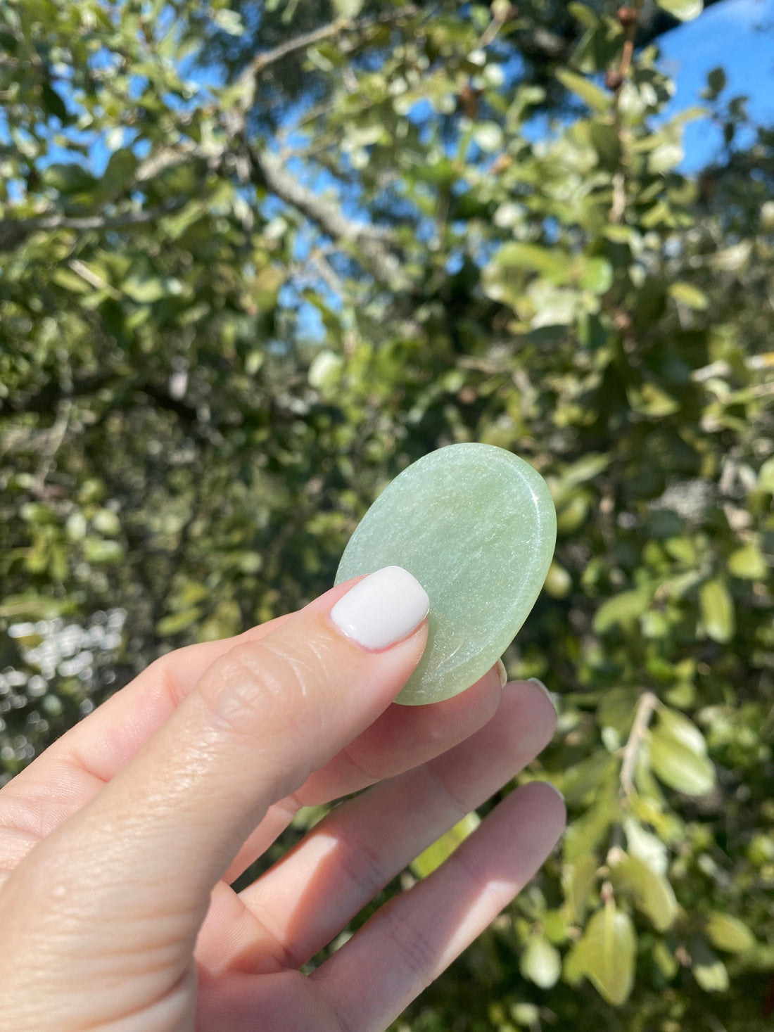 Hold the Green Aventurine Worry Stone to boost confidence, open your heart chakra, and fill yourself with a positive attitude