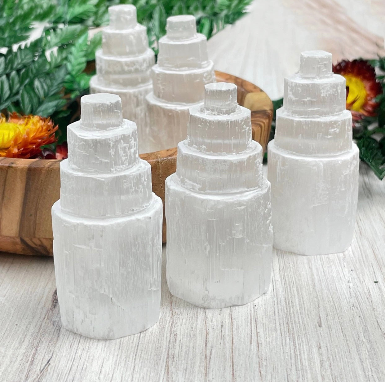 Four-tier Selenite Tower, a powerful healing crystal known for promoting peace, mental clarity, and removing negative energy