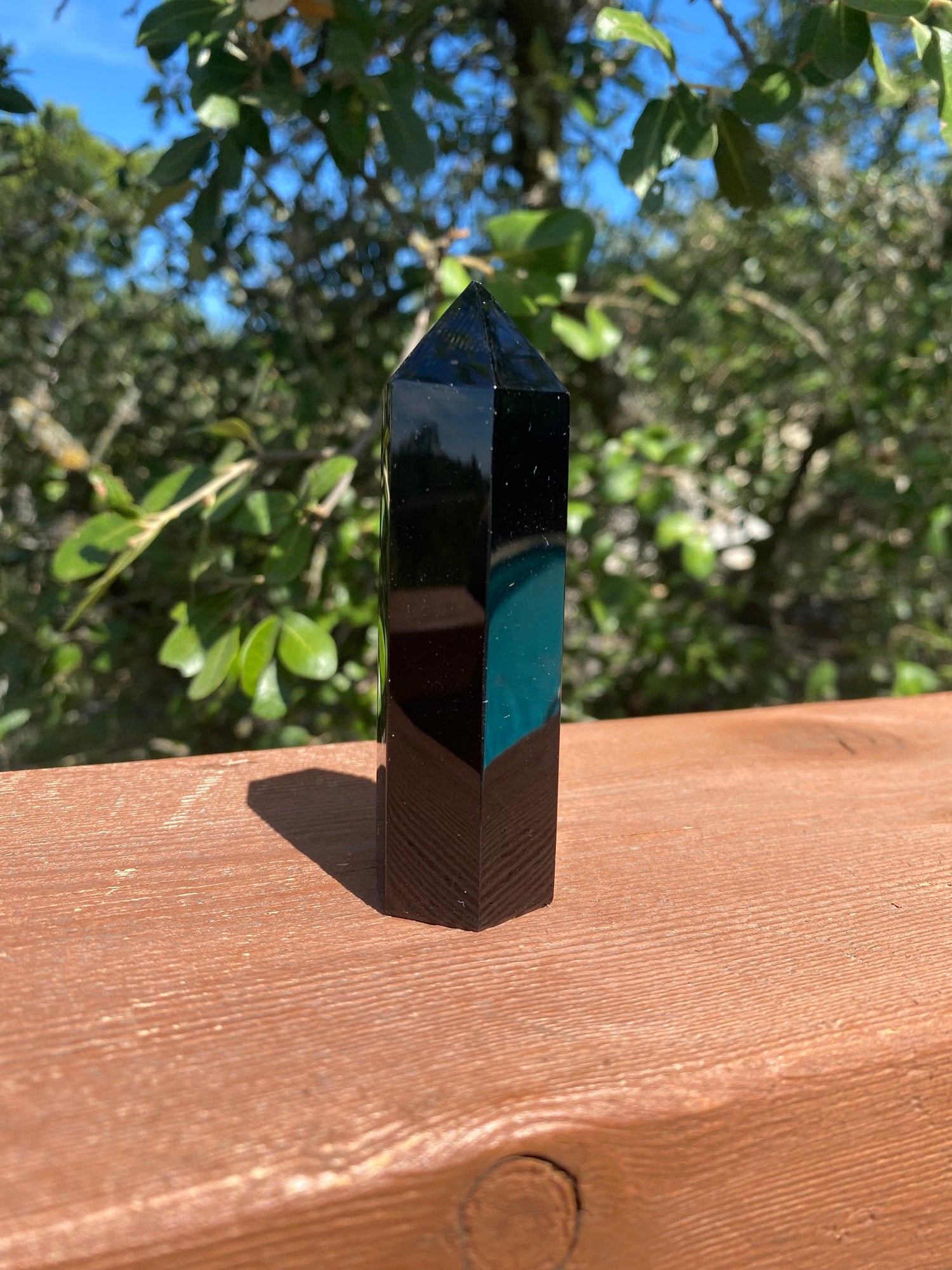 Obsidian Tower, formed from volcanic magma, reflects truth and protects against negativity, perfect for grounding and self-discovery